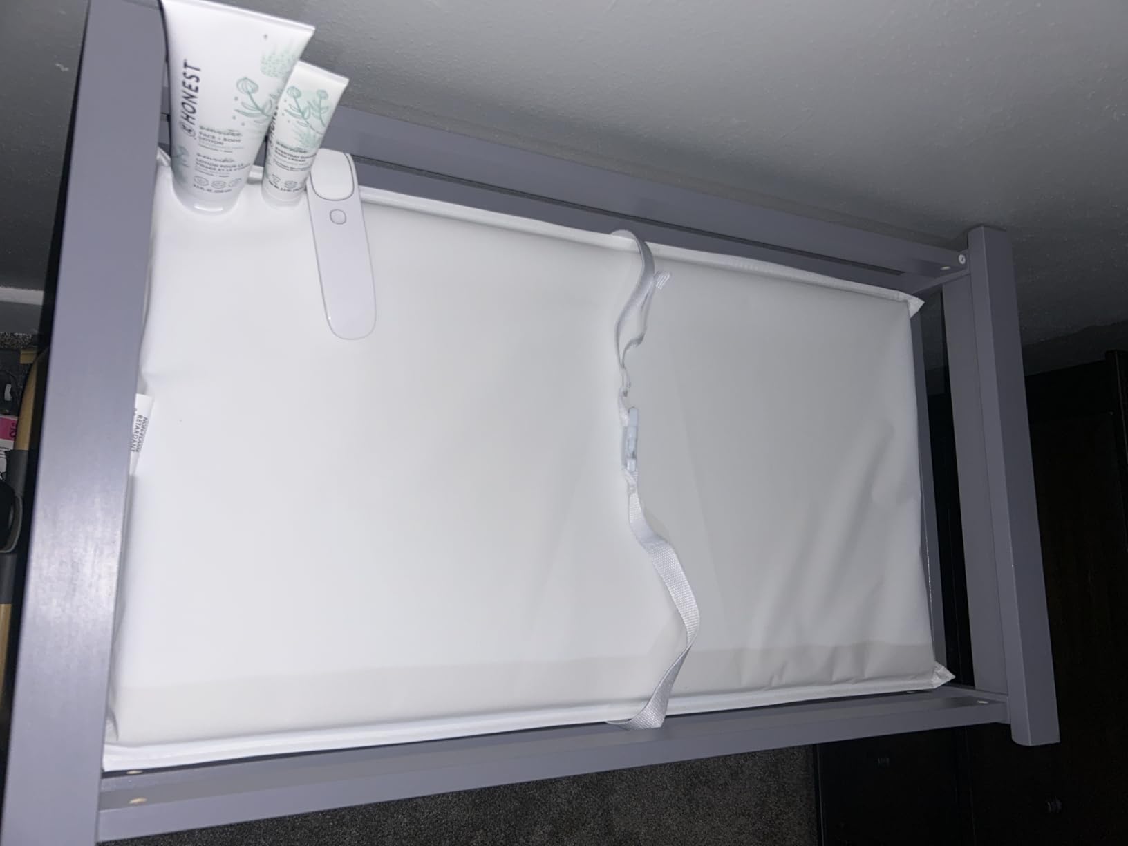 Badger Basket Modern Baby Changing Table - Nursery Furniture with Laundry Hamper and 3 Storage Drawers - Diaper Changing Station with Safety Belt, Changing Pad, and Organizer Baskets - Gray and White customer photo 1