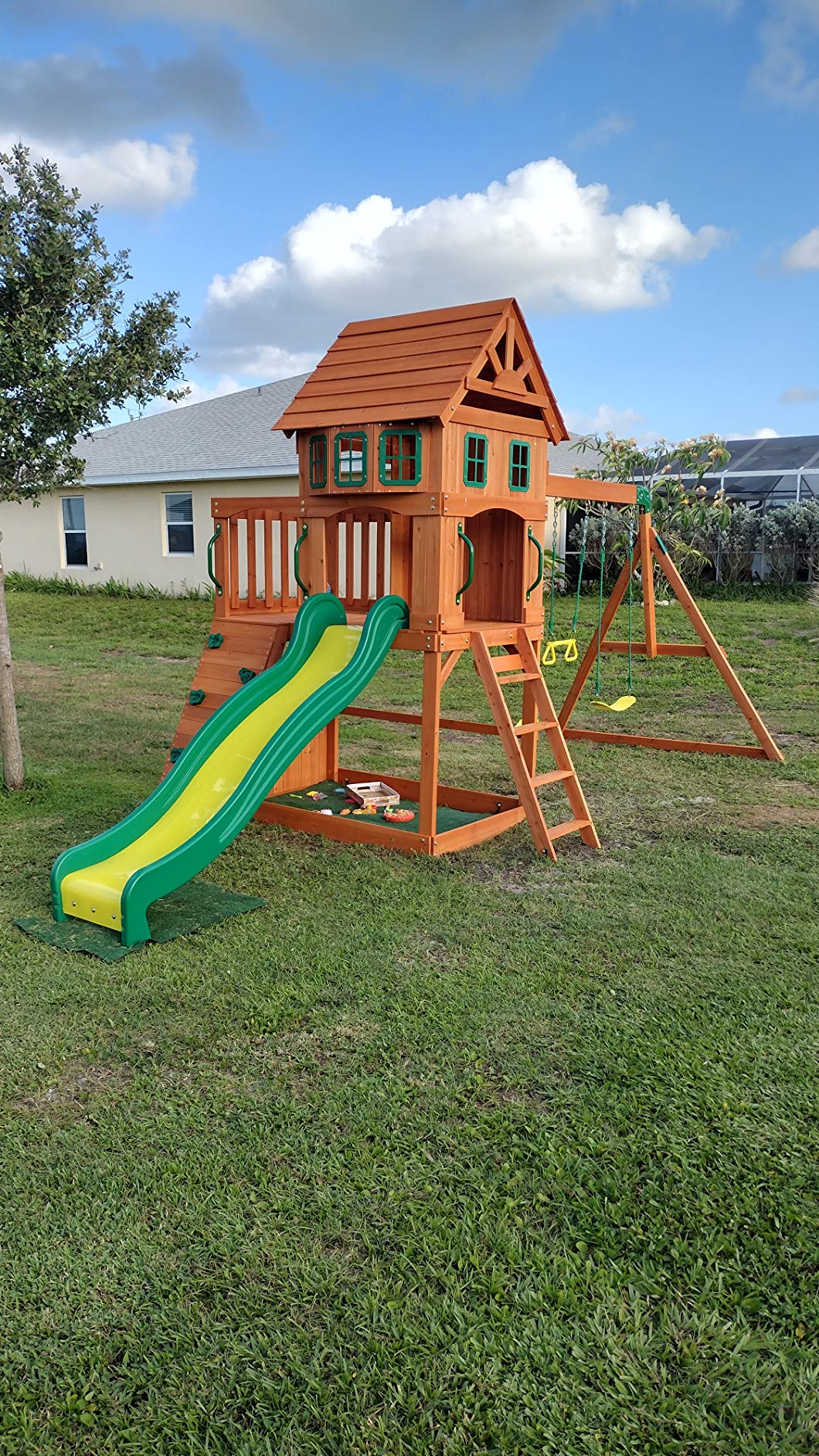 Backyard Discovery Atlantis Cedar Wood Swing Set with Wave Slide, Raised Clubhouse, Rock Wall, Belt Swings, Trapeze, Balcony, Lower Play Space, Snack Bar, Sandbox Area customer photo 2