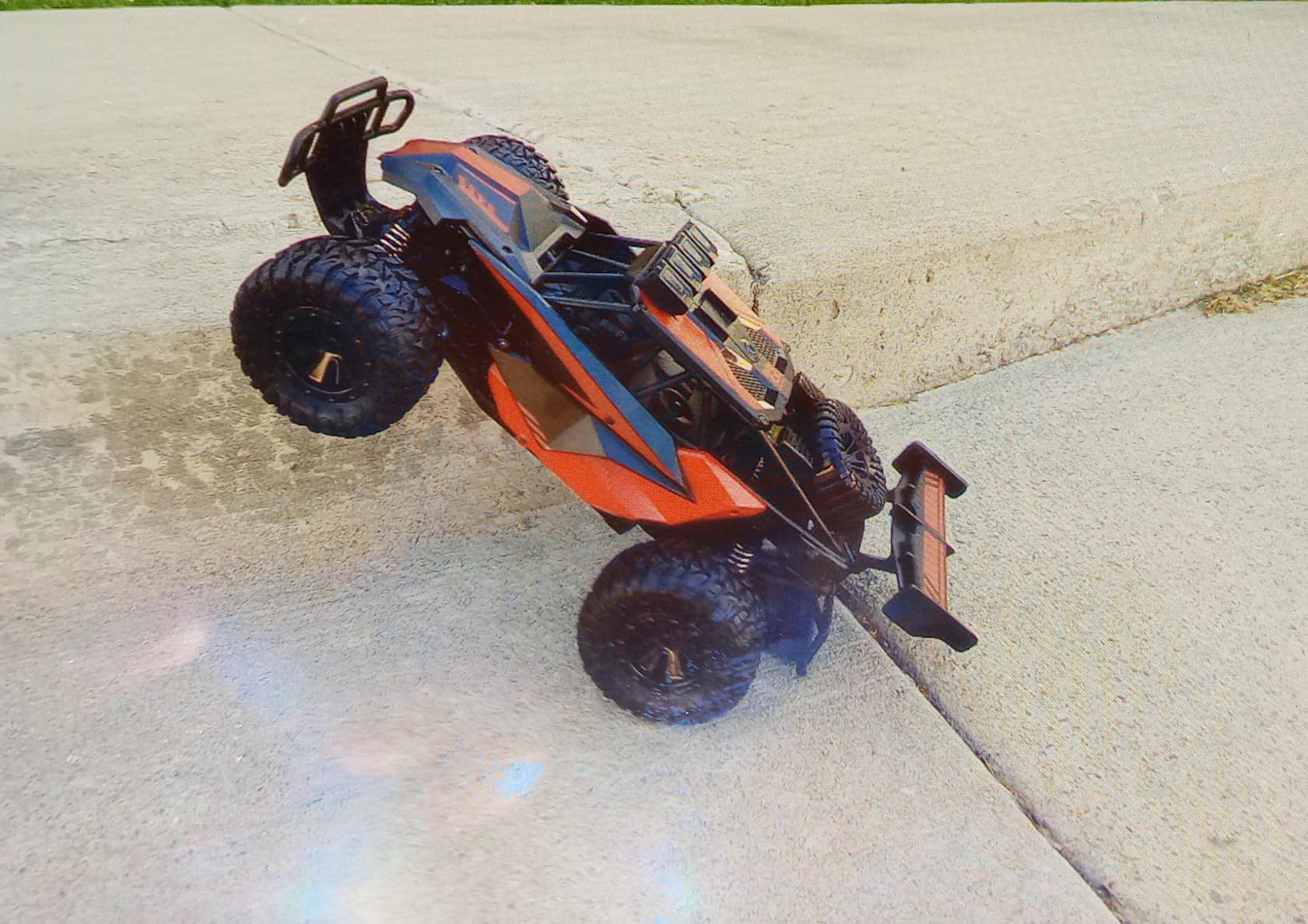 BLUEJAY Remote Control Car, 2.4GHz High Speed 33KM/H RC Cars Toys, 1:12 Monster RC Truck Off Road with LED Headlight and Rechargeable Battery Gifts for Adults Boys 8-12 customer photo 1