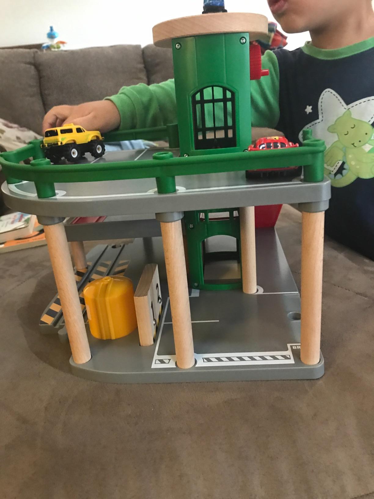 BRIO World Parking Garage - 7-Piece Wooden Toy Garage with 2 Cars, 1 Transporter Wagon, and Wooden Ramp Tracks - Works with All BRIO Train Sets - FSC-Certified - Ages 3 & Up customer photo 1