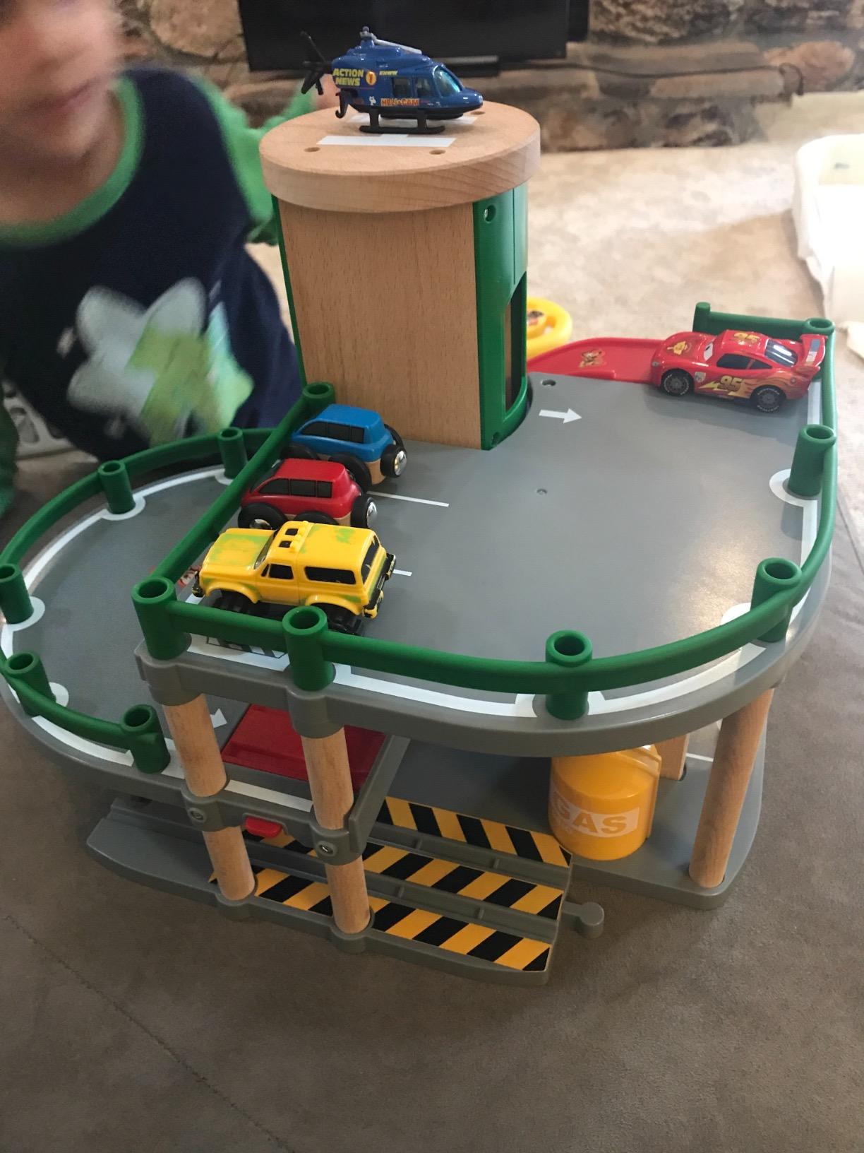 BRIO World Parking Garage - 7-Piece Wooden Toy Garage with 2 Cars, 1 Transporter Wagon, and Wooden Ramp Tracks - Works with All BRIO Train Sets - FSC-Certified - Ages 3 & Up customer photo 2