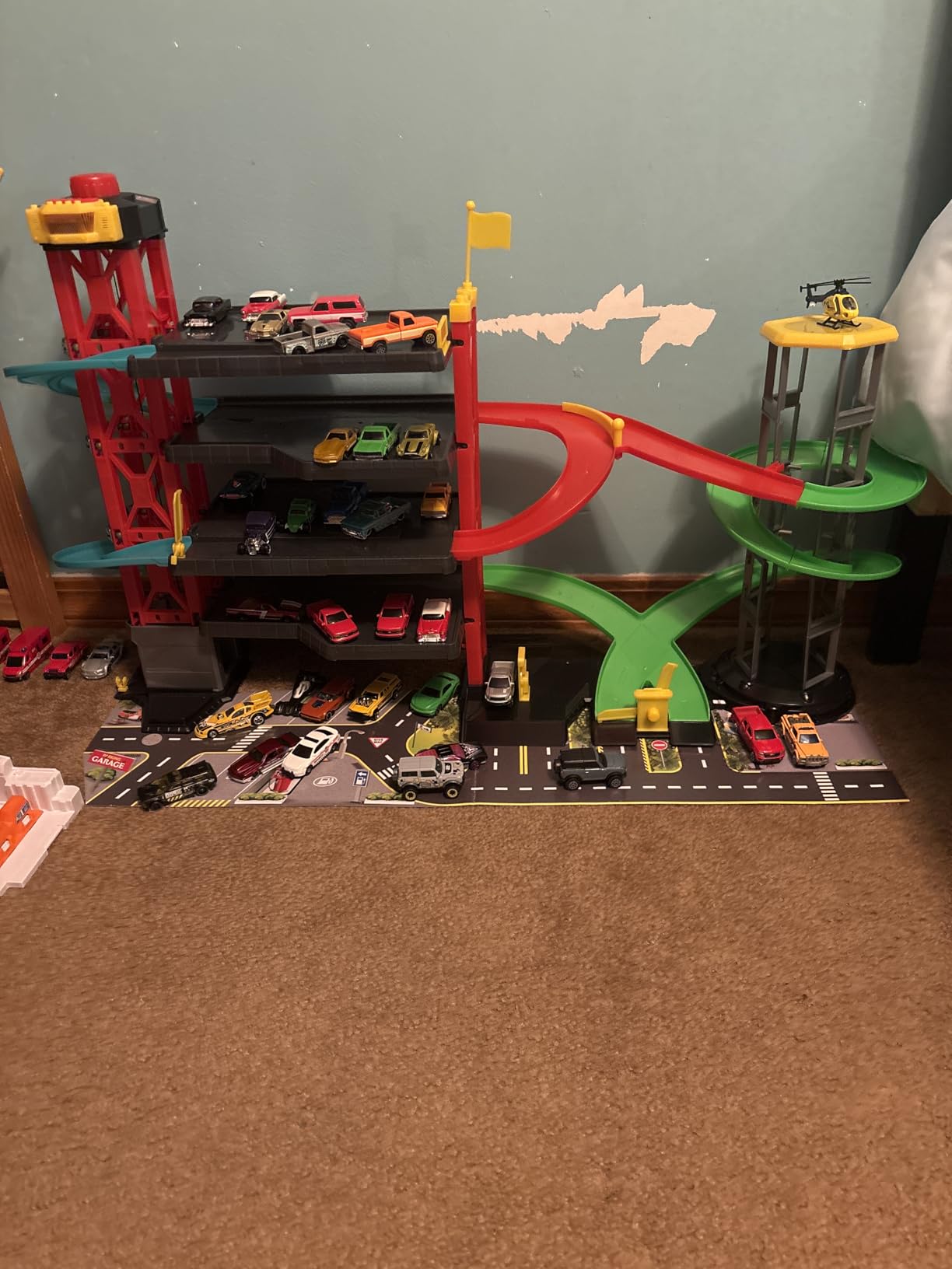DICKIE TOYS: Parking Garage Playset with 4 Die-Cast Cars and Die-Cast Helicopter, Four Roomy Parking Levels, Light and Sound Effects, for Ages 3 and up customer photo 1