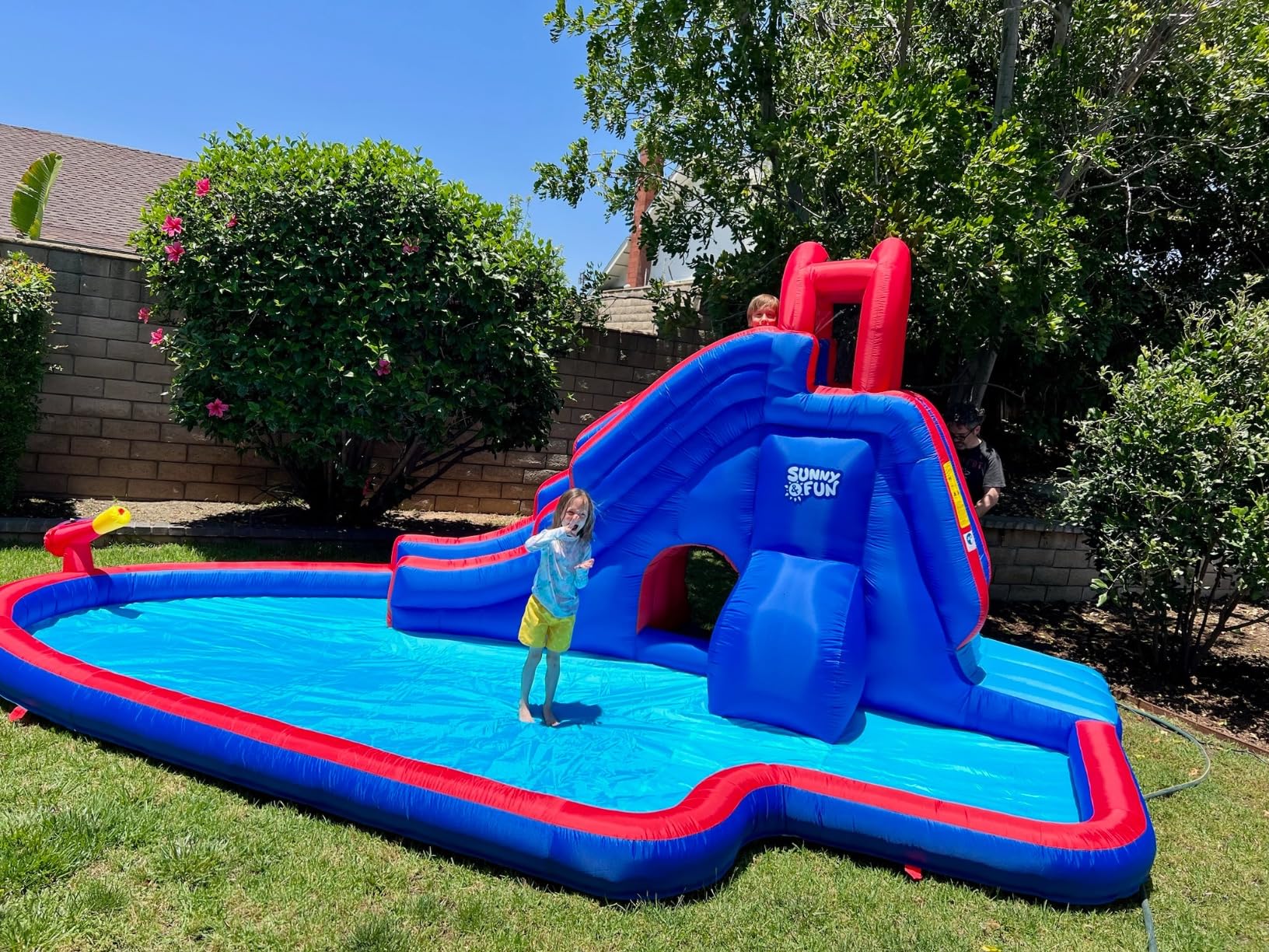 Sunny & Fun Deluxe Inflatable Water Slide Park & Splash Pool with Tunnel - Heavy-Duty for Outdoor Fun - Climbing Wall - Easy to Set Up & Inflate with Included Air Pump & Carrying Case customer photo 1