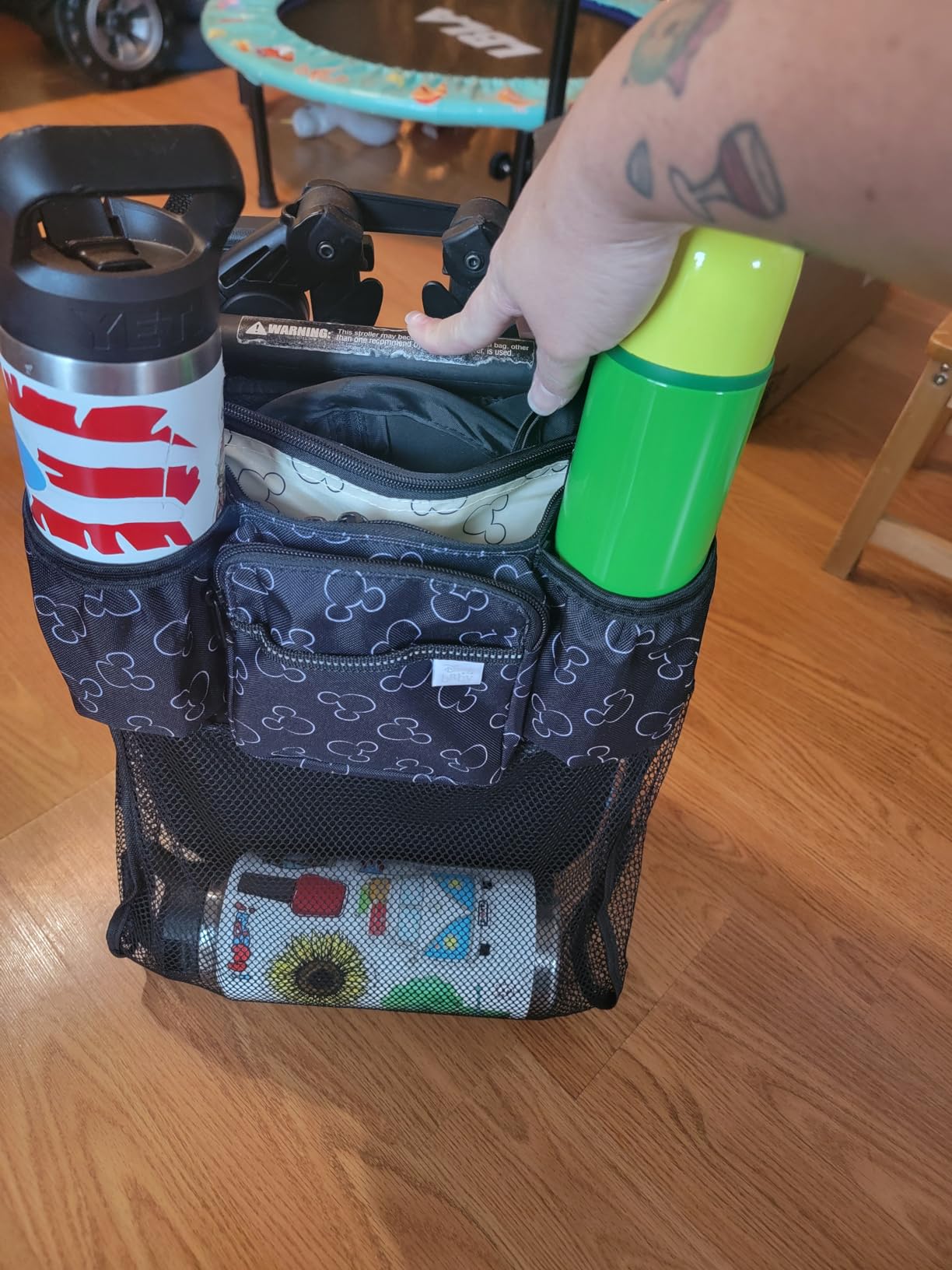 Disney Baby by J.L. Childress Cups 'N Cargo Stroller Caddy Organizer with Cup Holder - Stroller Accessories Bag, Travel Essential, Mesh Storage Attachment, Universal Fit - Mickey Mouse, Black customer photo 2