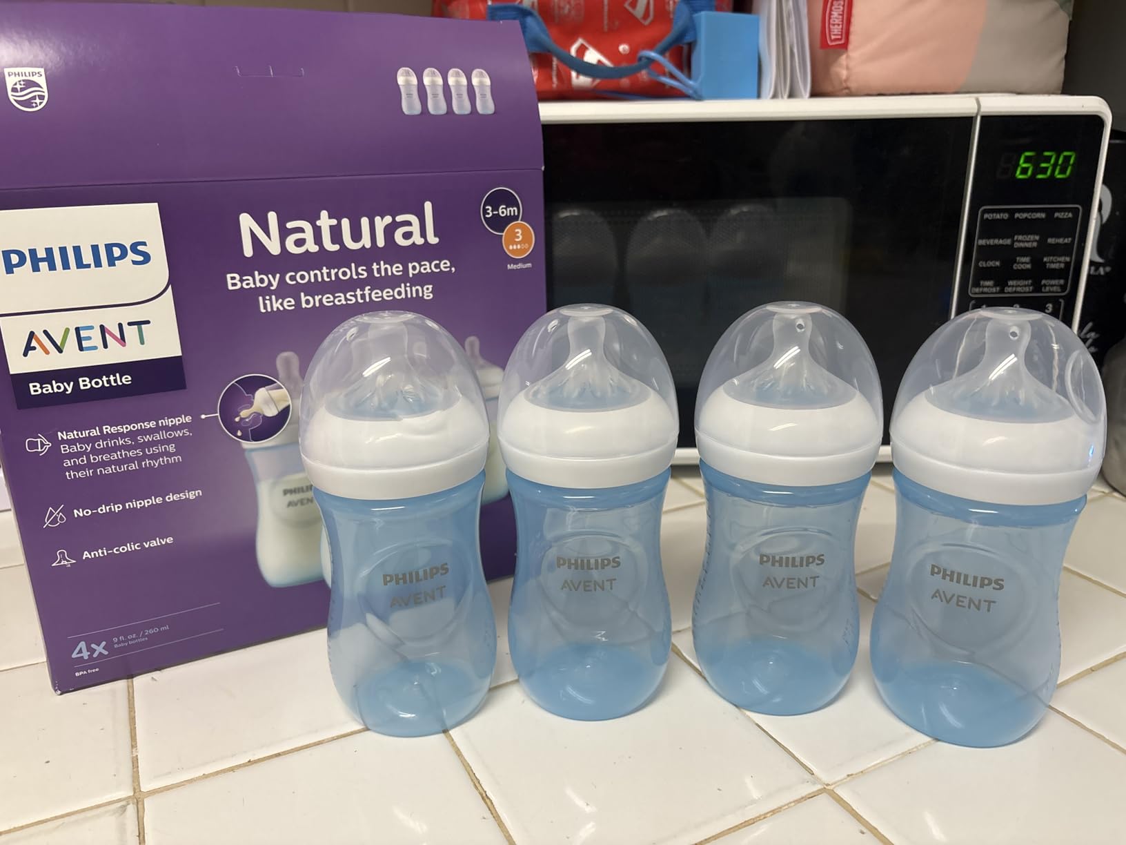 Philips Avent Natural Baby Bottles with Natural Response Nipples (Medium Flow, Flow 3), 9oz, 4-Pack, SCY903/04 customer photo 1