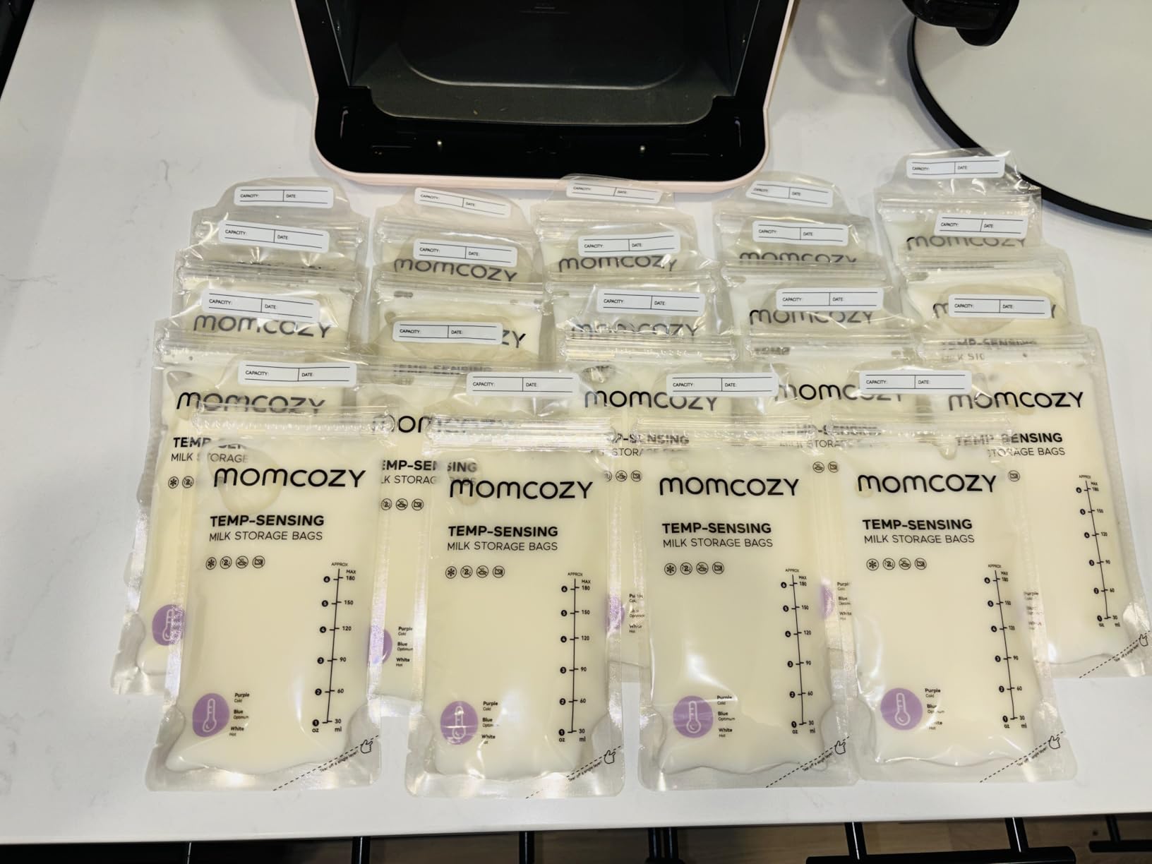 Momcozy Breastmilk Storing Bags, Temp-Sensing Discoloration Milk Storing Bags for Breastfeeding, Disposable Milk Storage Bag with 6 Ounce Self Standing, No-Leak Milk Freezer Storage Pouches, 120pcs customer photo 2