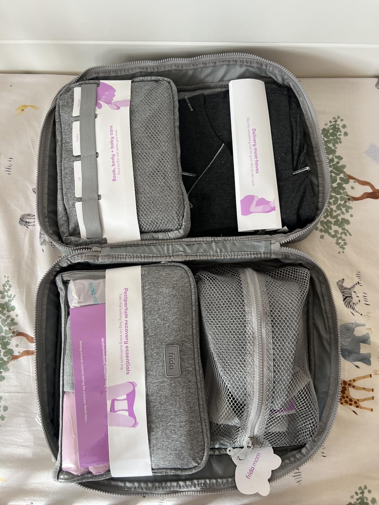 Frida Mom 30pc Pre-Packed Hospital & Diaper Bag Essentials Gift Set, Includes Labor, Postpartum, & Newborn Grooming Kit in One, Easy to Organize with Removable Toiletry Bags, & Suitcase Strap customer photo 1