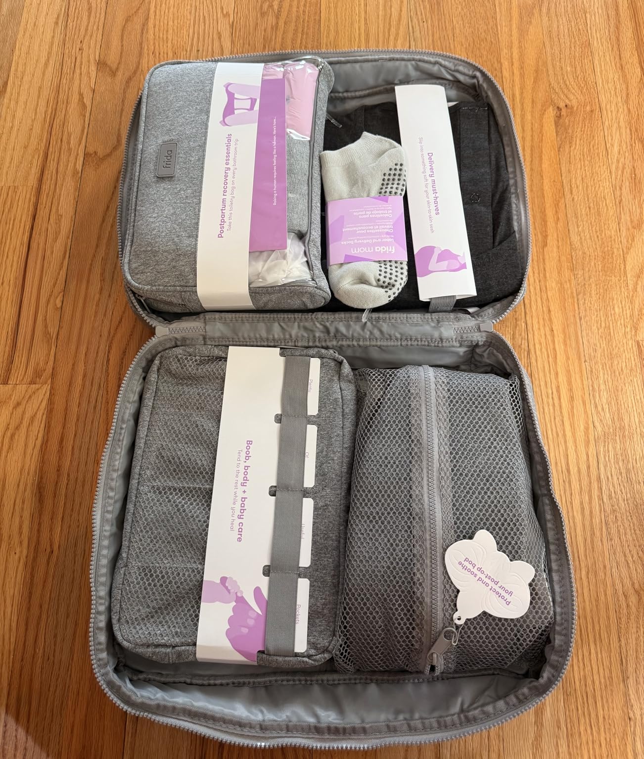 Frida Mom 30pc Pre-Packed Hospital & Diaper Bag Essentials Gift Set, Includes Labor, Postpartum, & Newborn Grooming Kit in One, Easy to Organize with Removable Toiletry Bags, & Suitcase Strap customer photo 2