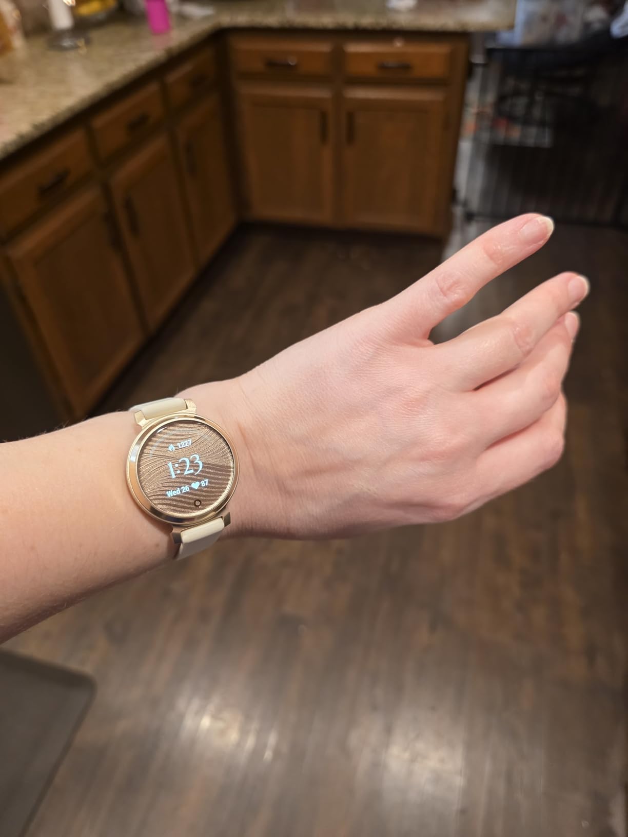 Garmin Lily 2, Small and Stylish Smartwatch, Hidden Display, Patterned Lens, Up to 5 Days Battery Life, Coconut customer photo 1