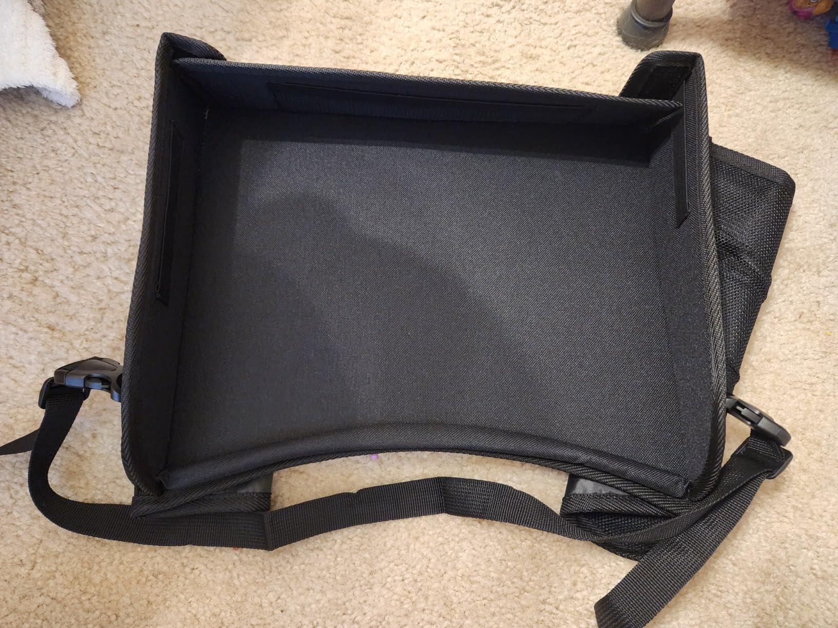 Nuby Kids Foldable Lightweight Travel Activity Lap Desk Tray with Pockets|Stay Organized & Mess Free on Car Rides, Plane Trips, Home|Adjustable Strap Keeps Desk Secure or Carry Strap for Travel|Black customer photo 1