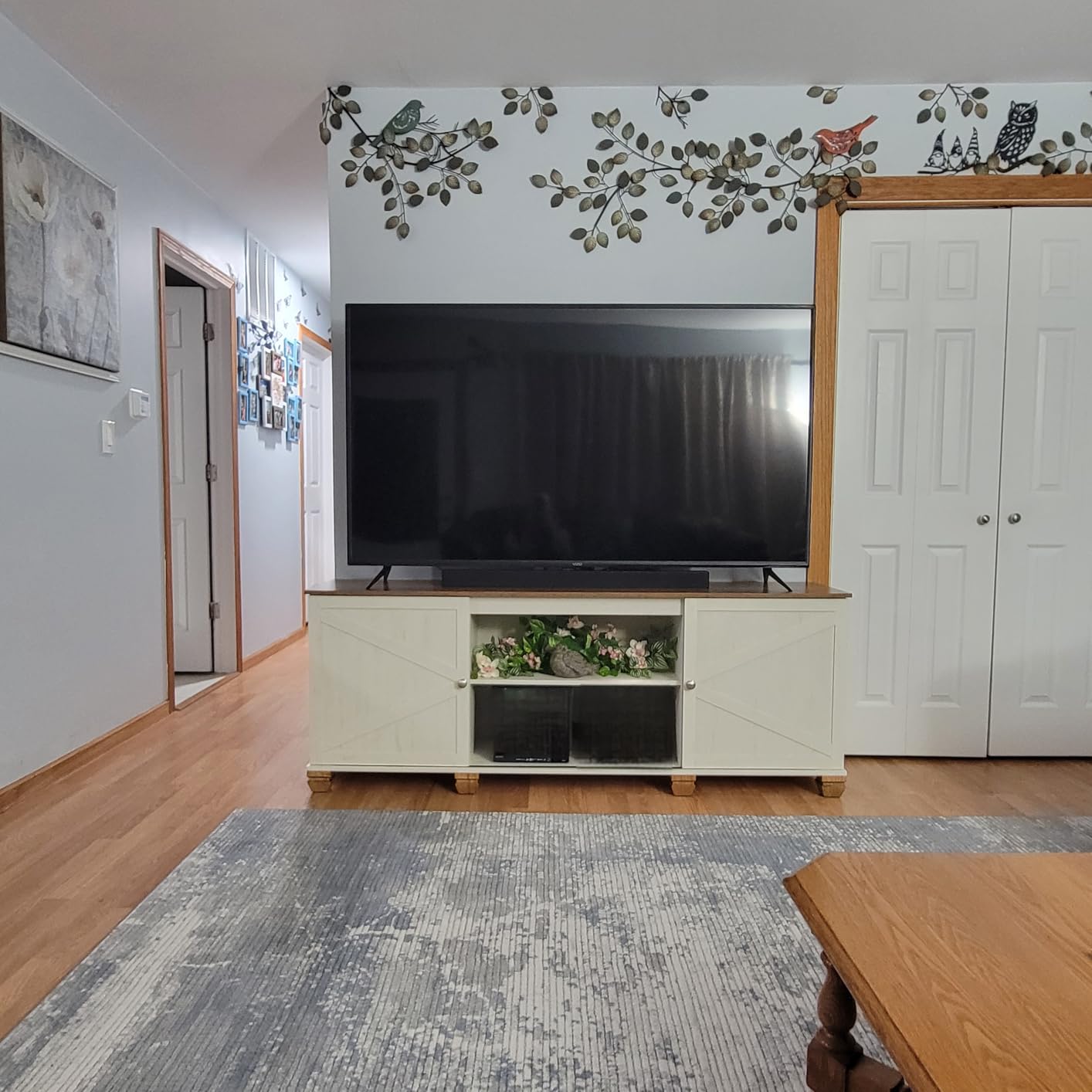 VASAGLE Farmhouse TV Stand for TVs up to 65 Inches, Entertainment Center with Storage Cabinets and Sliding Barn Doors, Media Console Table for Living Room, Rustic White and Honey Brown ULTV535W01 customer photo 2