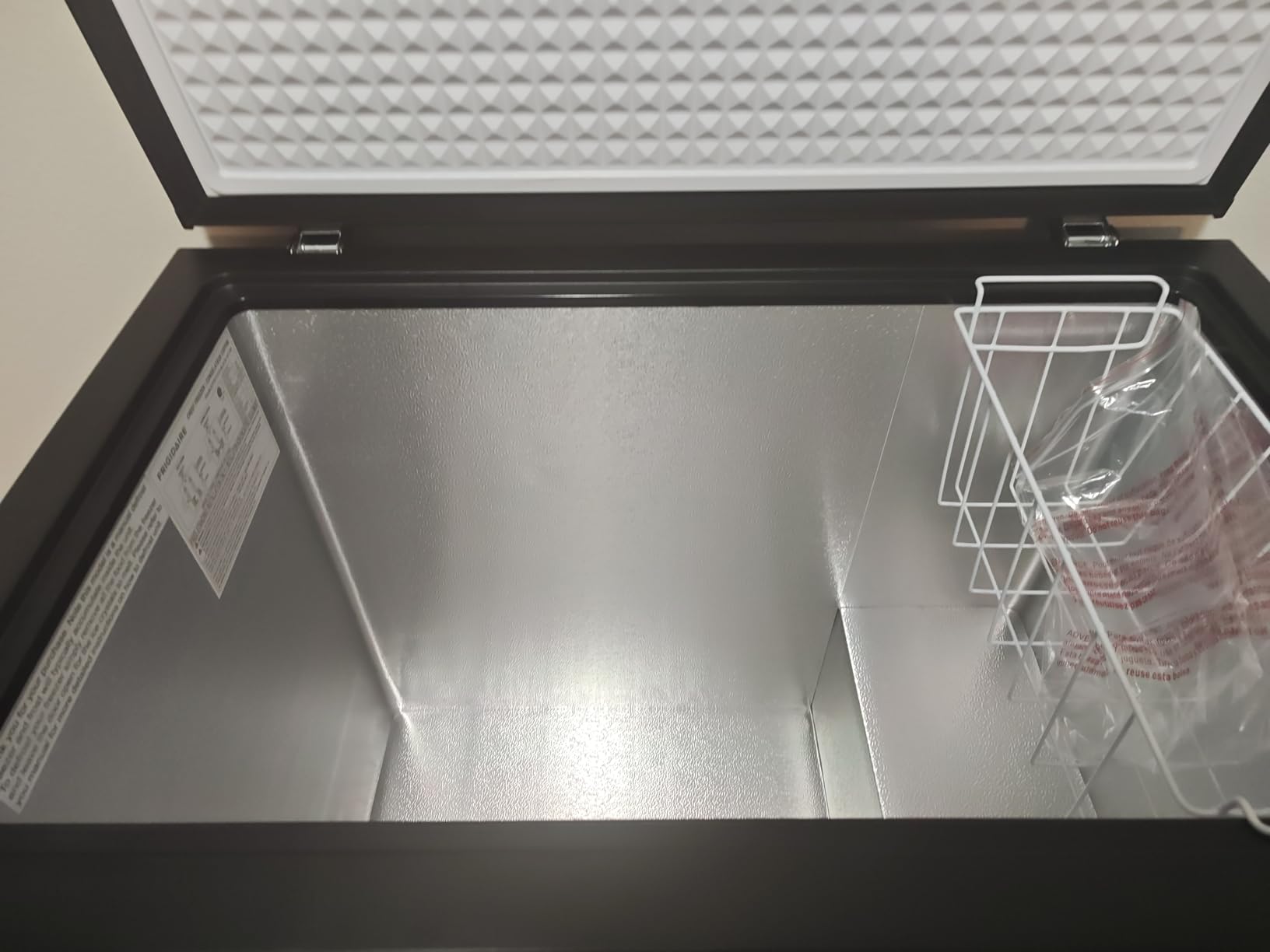Frigidaire Chest Deep Freezer, 7 Cu. Ft. Capacity, Shiny Stainless Steel Top Lid Design, Adjustable Thermostat, Removable Vinyl Coated Wire Basket, Easy Defrost Drain, Garage Ready customer photo 1