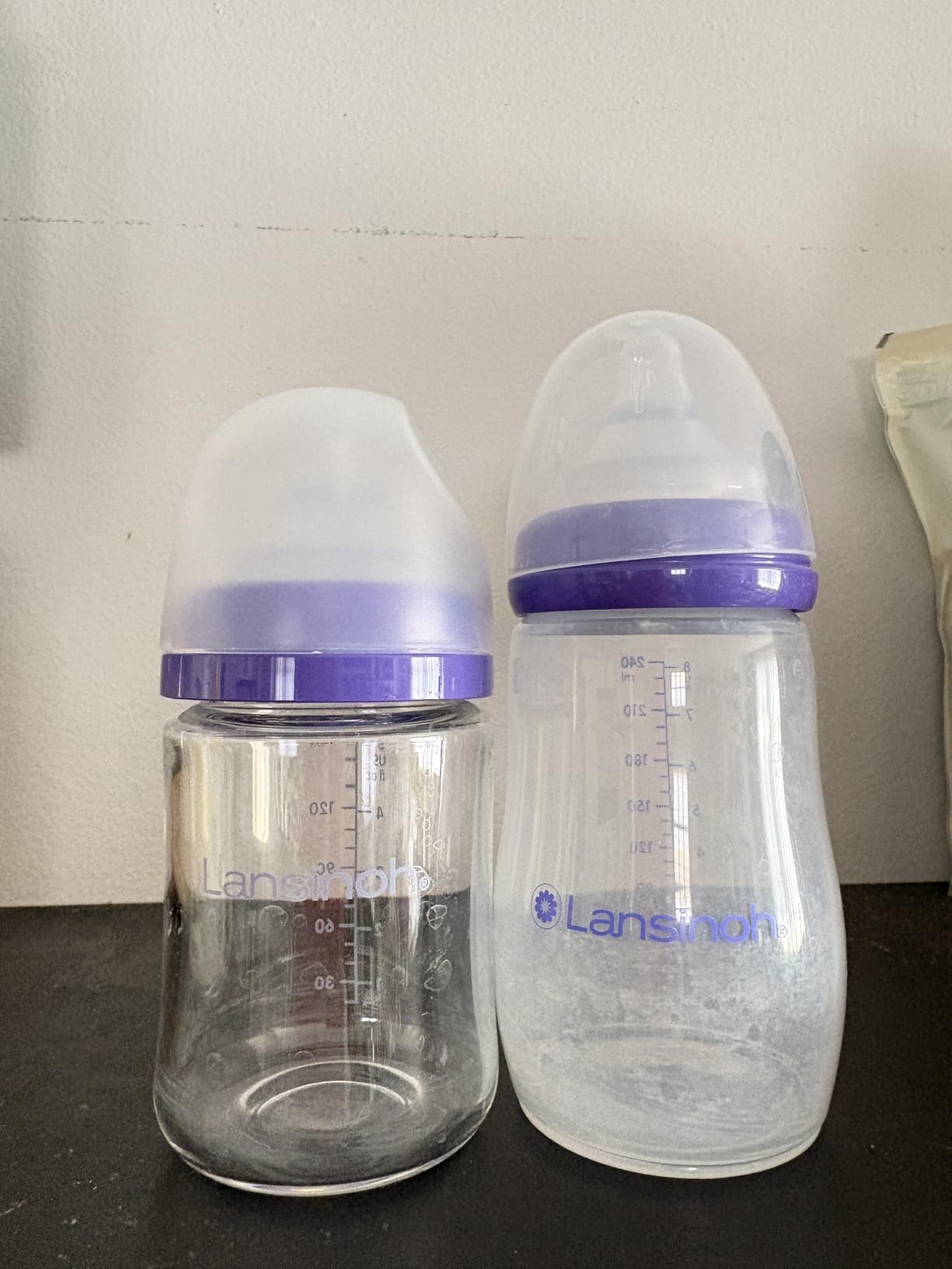 Lansinoh Anti-Colic Glass Baby Bottles, 5 Ounces, 4 Count, Includes 4 Extra Slow Flow Nipples (Size XS, Newborn), Baby Essentials customer photo 2