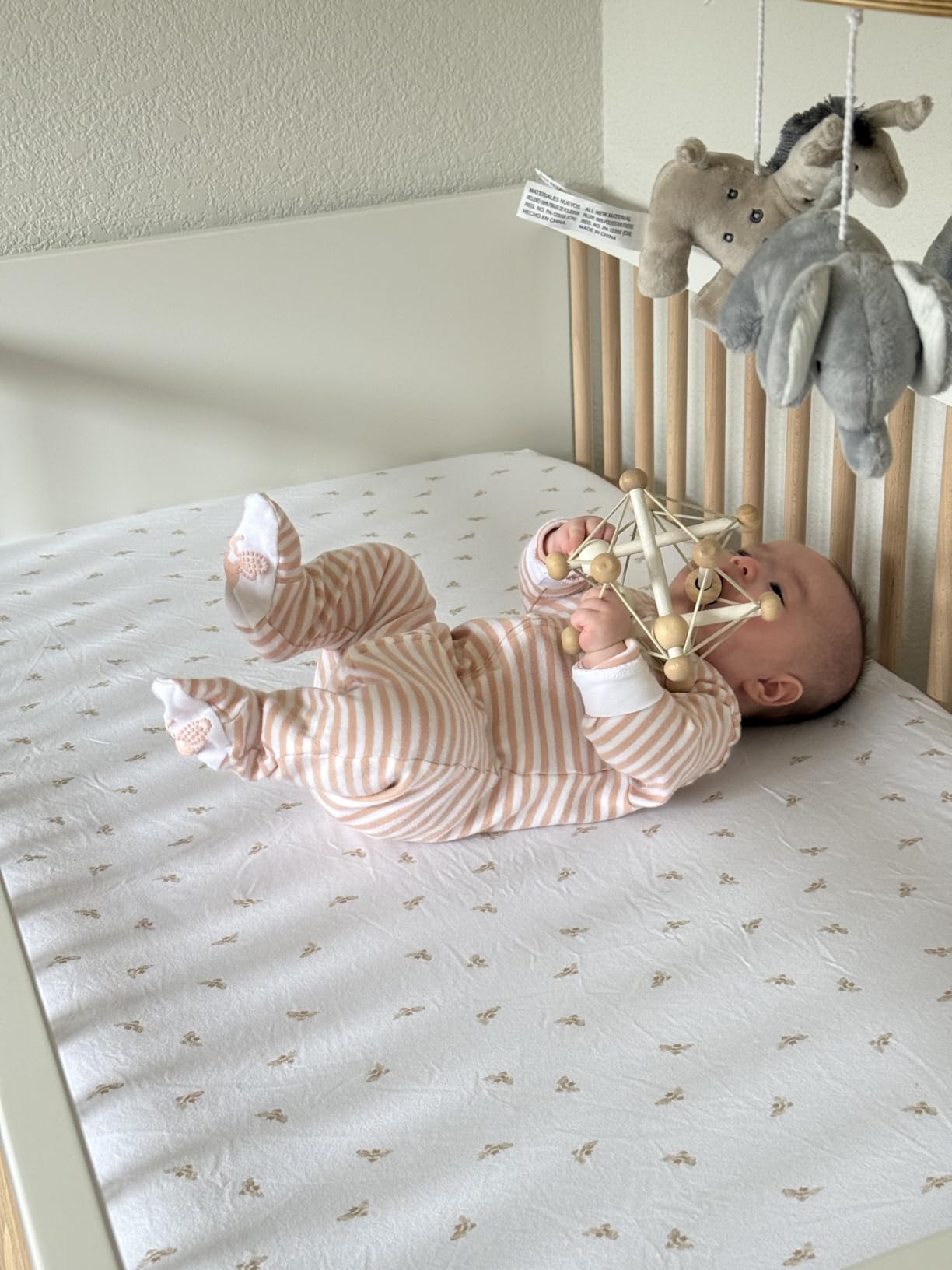 Manhattan Toy Artful Skwish Wooden Baby Rattle and Motor Skill Activity Toy for Infants and Toddlers customer photo 2
