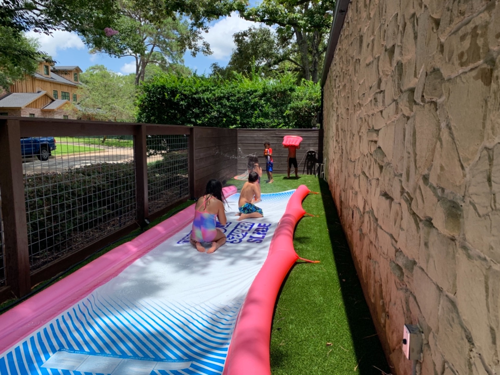 Wow Sports Super Inflatable Lawn Water Slide - 25 ft - Zigzag Sprinklers - Includes 2 Sleds - Kids & Adults customer photo 2