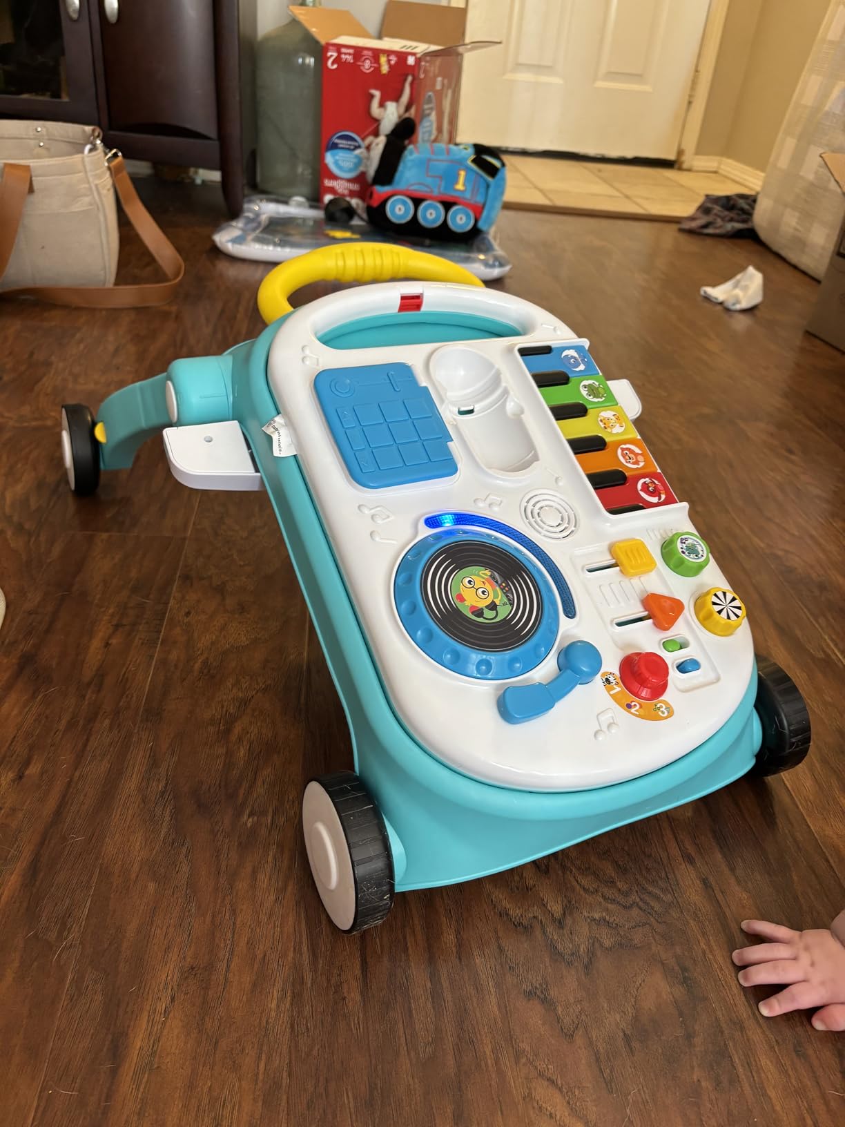 Baby Einstein Musical Mix 'N Roll 4-in-1 Push Walker, Activity Center, Toddler Table & Floor Toy, 100+ Songs & Phrases, DJ Station with Piano customer photo 1