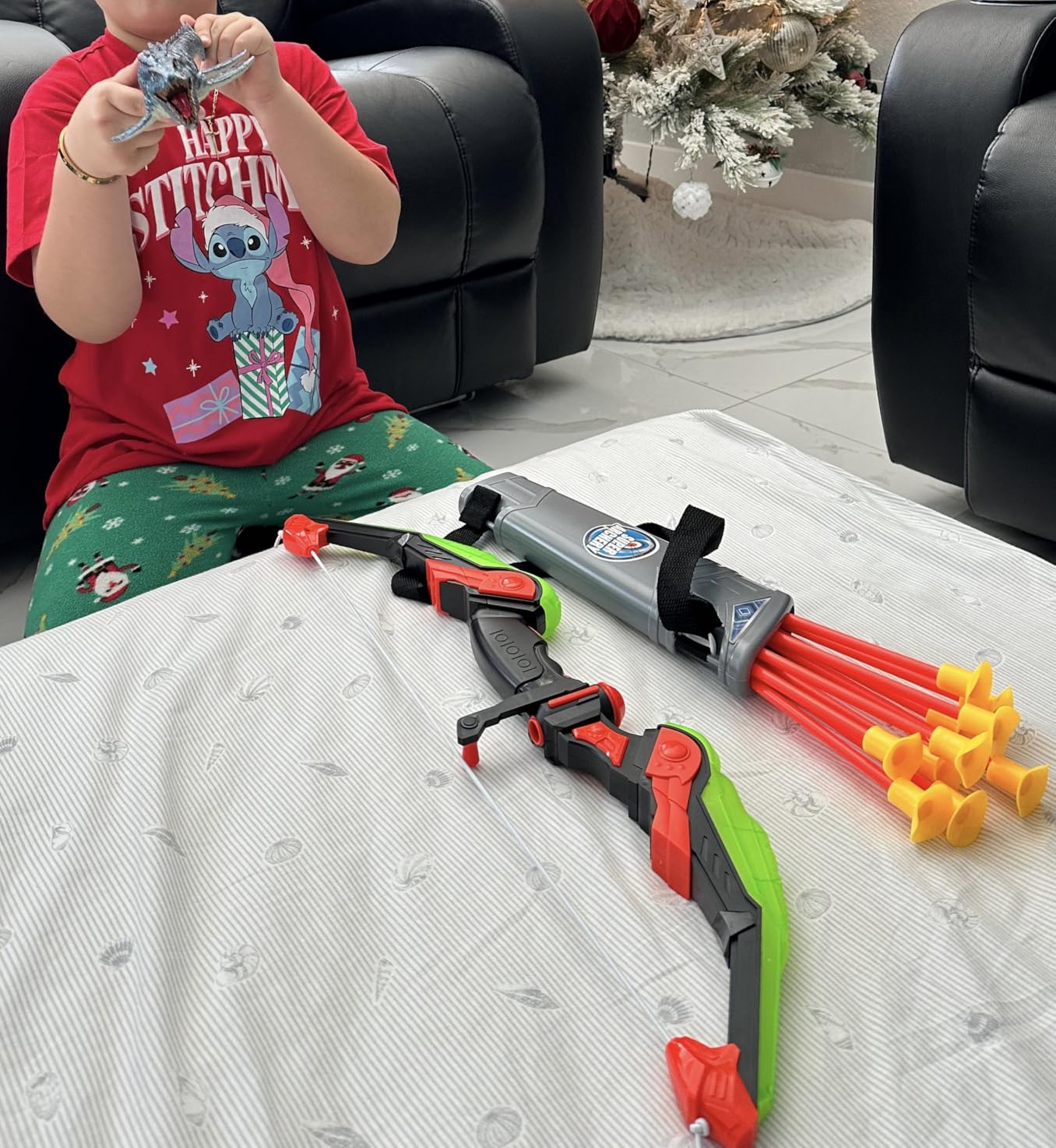 TEMI Bow and Arrow Set for Kids - Archery Toy Set - LED Light Up with Suction Cup Arrows, Target & Quiver, Indoor and Outdoor Toys for Children Boys Girls customer photo 1