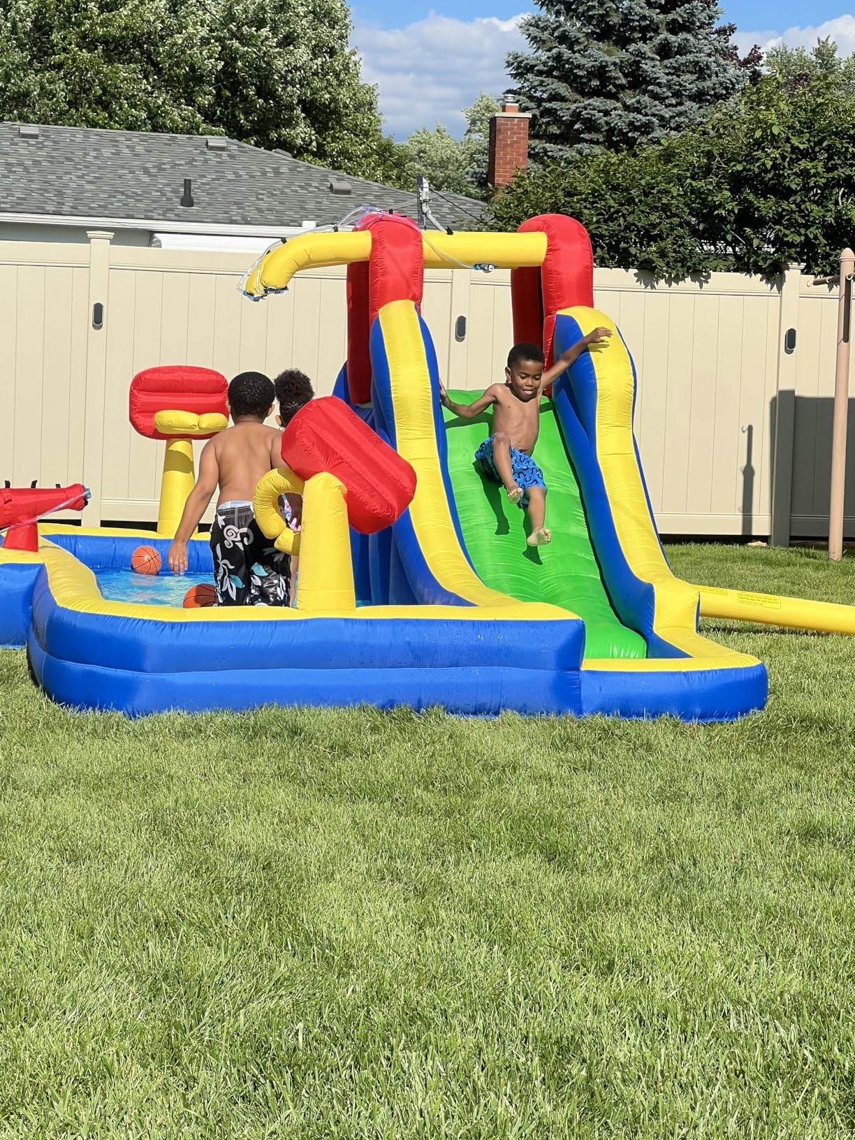WELLFUNTIME Inflatable Water Park with Blower, Bouncy Castle with Water Cannon and Double Basketball Rings customer photo 2