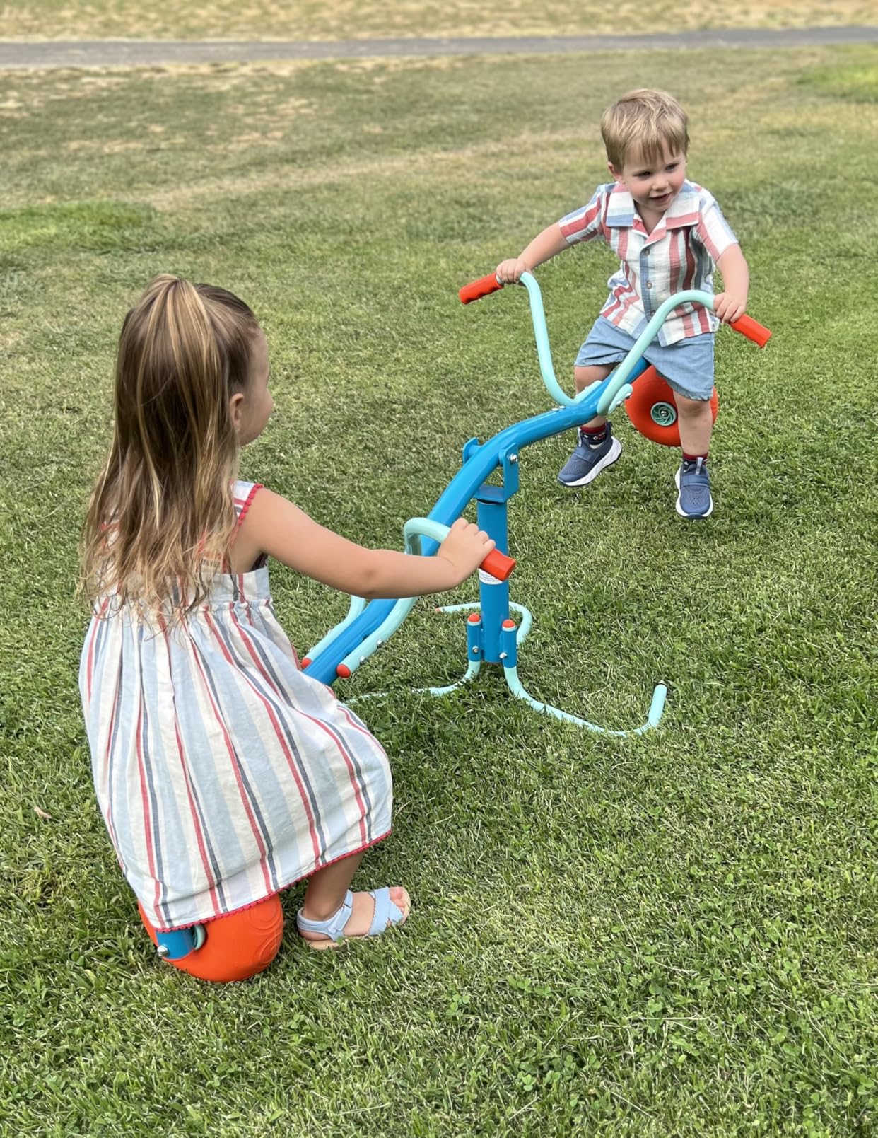 TP Toys Spiro Seesaw Sit and Spin Teeter Totter with 360 Spin Kids Outdoor Play Equipment for Backyard, Playground, or Indoor Fun Boys and Girls Ages 3-10 customer photo 1