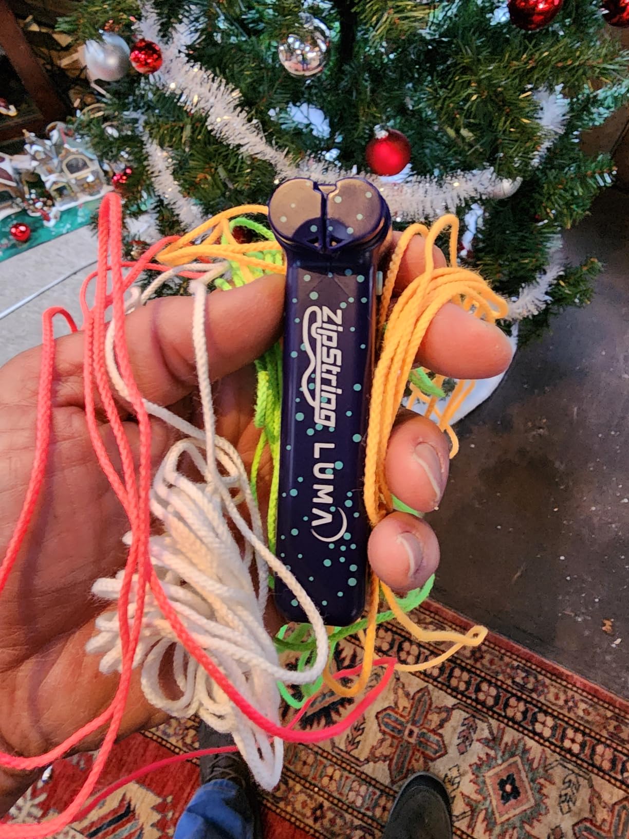 ZipString Luma - The Patented Glow-in-The-Dark Toy that Flies a Loop of String, Creates Endless Shapes and Tricks Built-in LED for Glowing Fun. Perfect STEM Gift for Kids & Adults. Wonderment Awaits customer photo 1