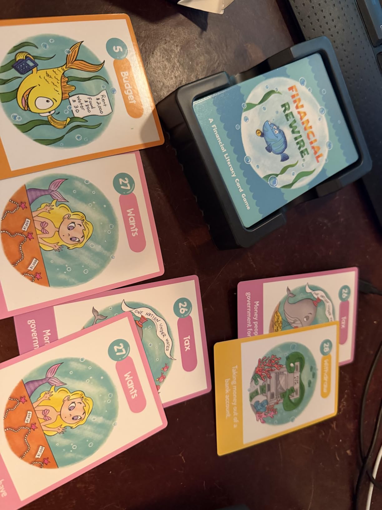 Finance Go Fish - 3-in-1 Financial Literacy Card Game for Kids Ages 5-12 | Go Fish, Memory & Old Maid | Educational Money Vocabulary Deck (Beginner) customer photo 1