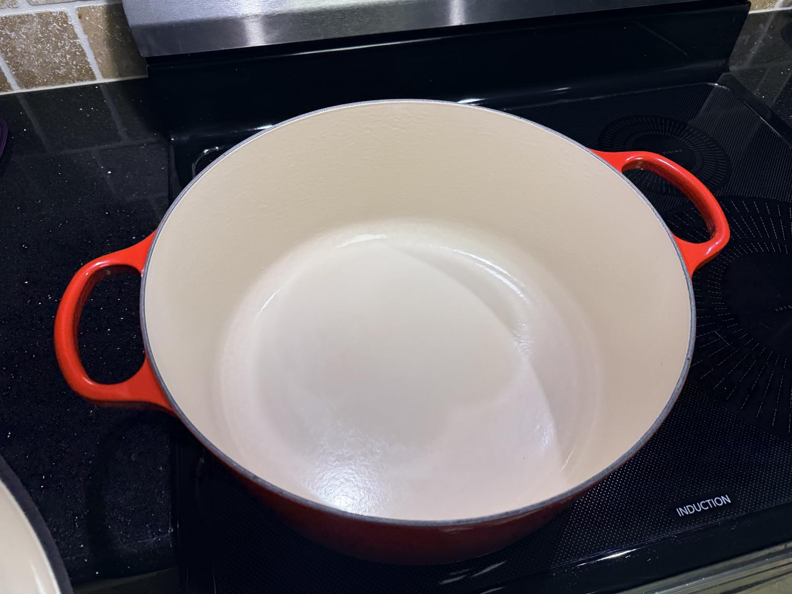 Le Creuset Enameled Cast Iron Signature Round Dutch Oven, 5.5 qt., Flame customer photo 2