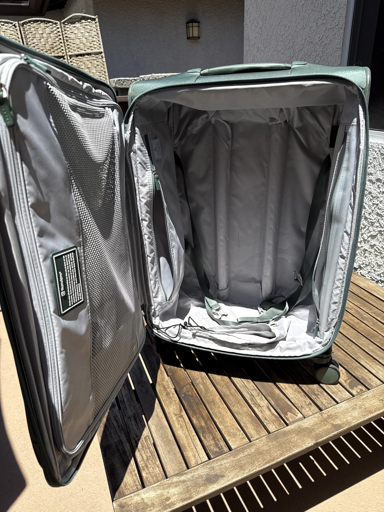 Travelpro VersaPack+ Lightweight Softside Expandable Carry on Luggage, 8 Spinner, TSA Lock, Compact Carry On 20-Inch, Estate Blue customer photo 1