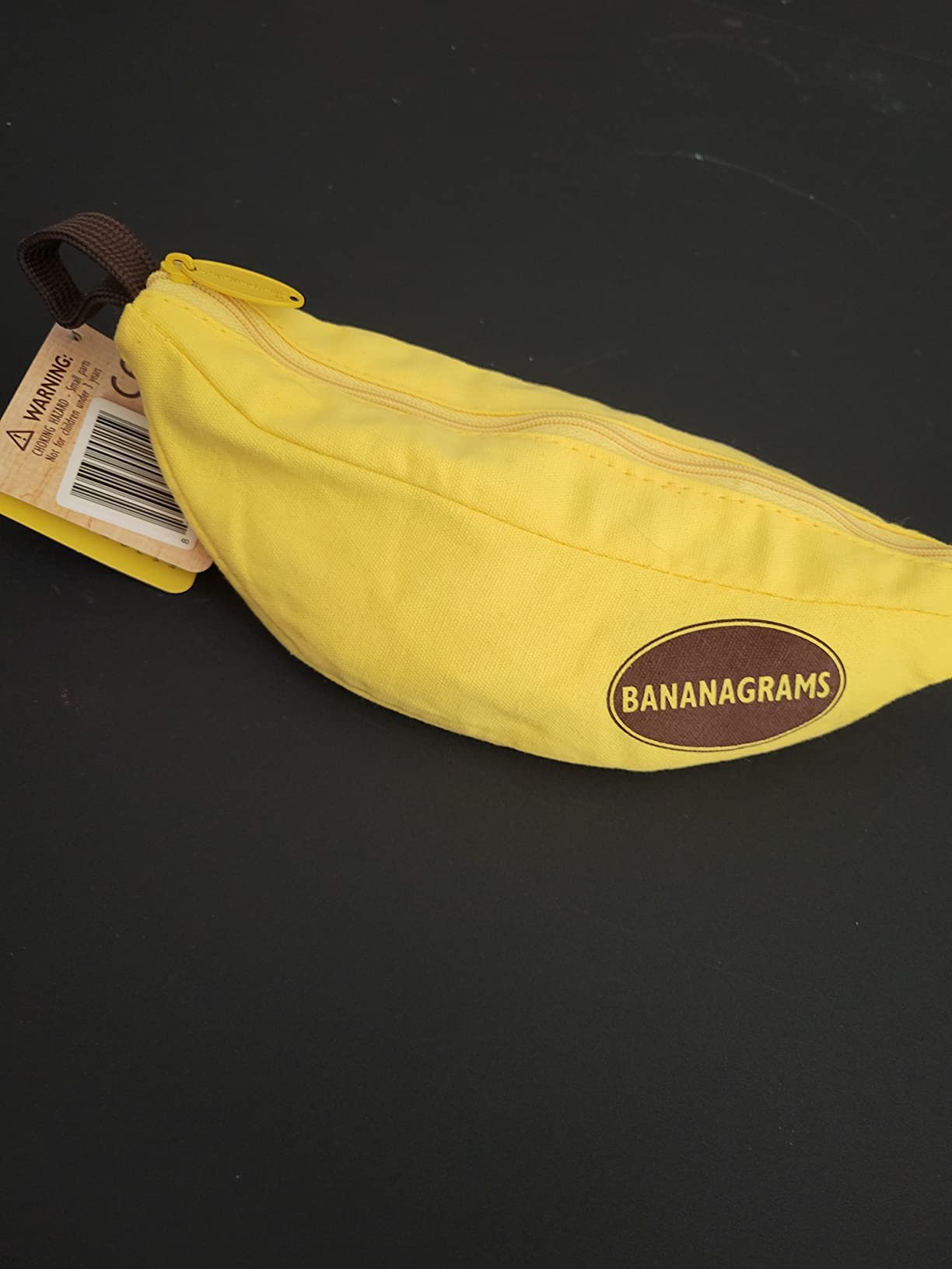 Bananagrams Classic Word Game, 144 Tiles in Banana Pouch, Travel Game customer photo 2