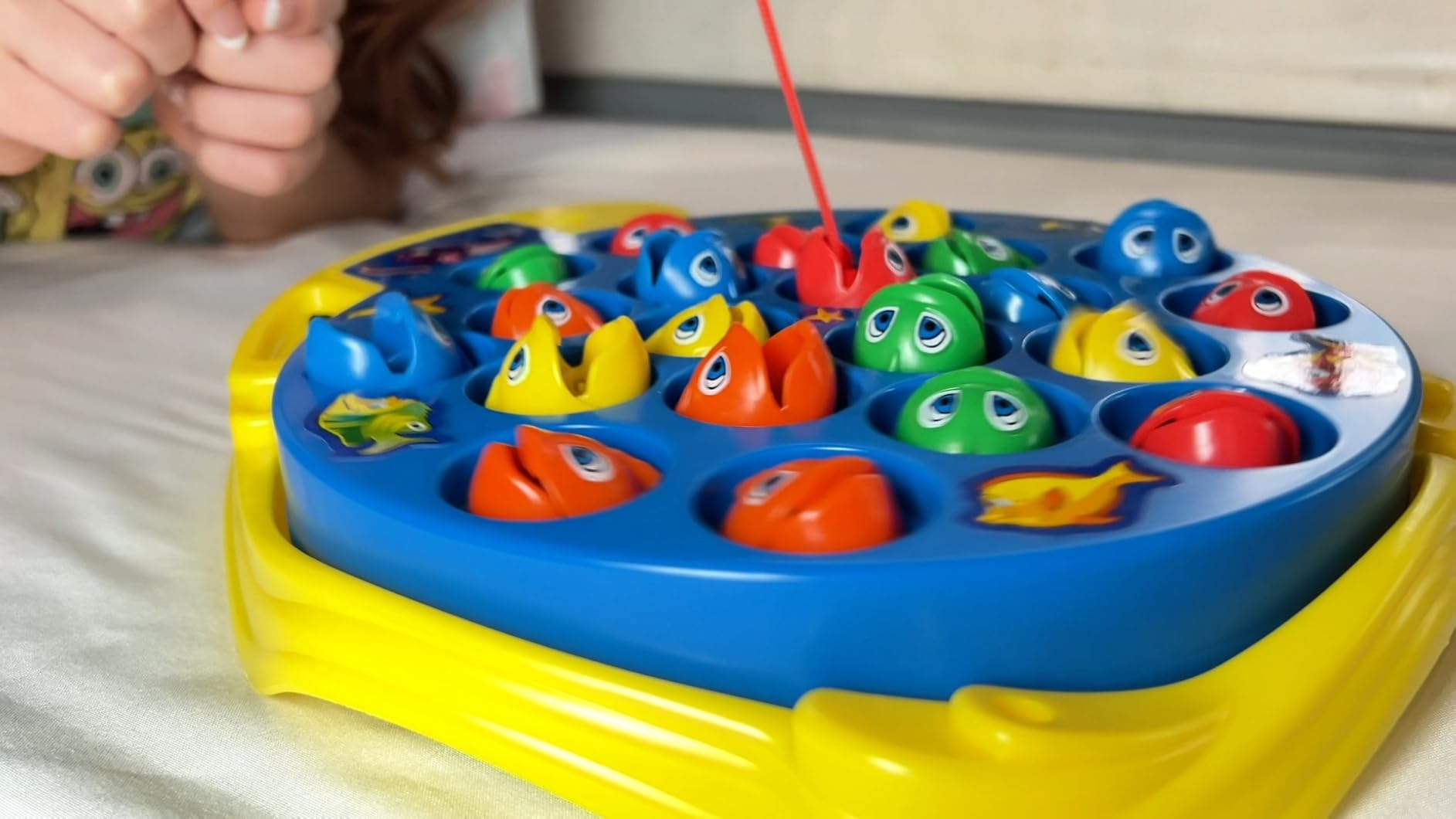 Let's Go Fishin' Game by Pressman - The Original Fast-Action Fishing Game!, 1-4 players customer photo 1