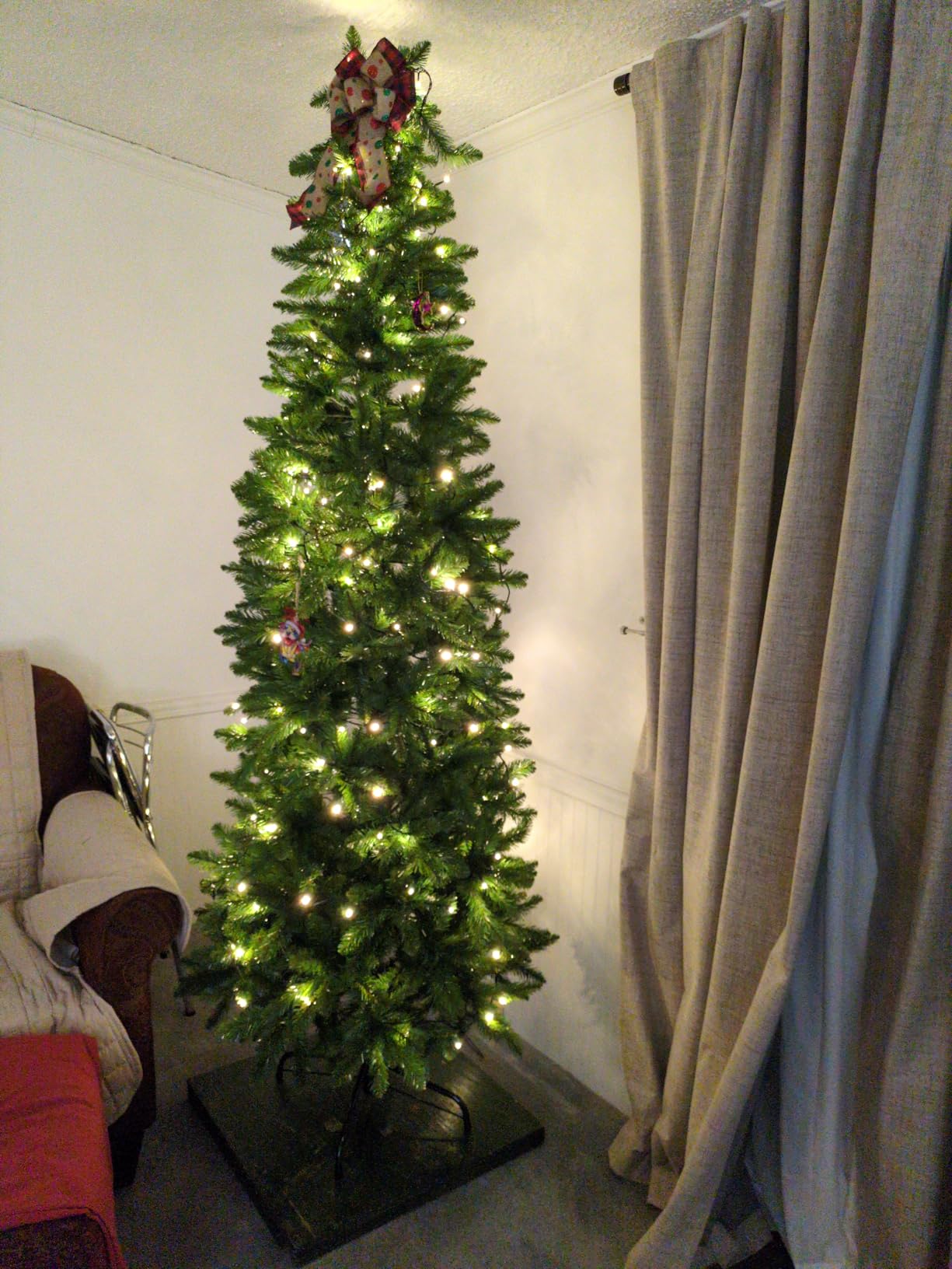 National Tree Company 7.5ft Unlit Kingswood Fir Slim Christmas Tree | 1,075 Tips, Includes Stand, Artificial, Green customer photo 2