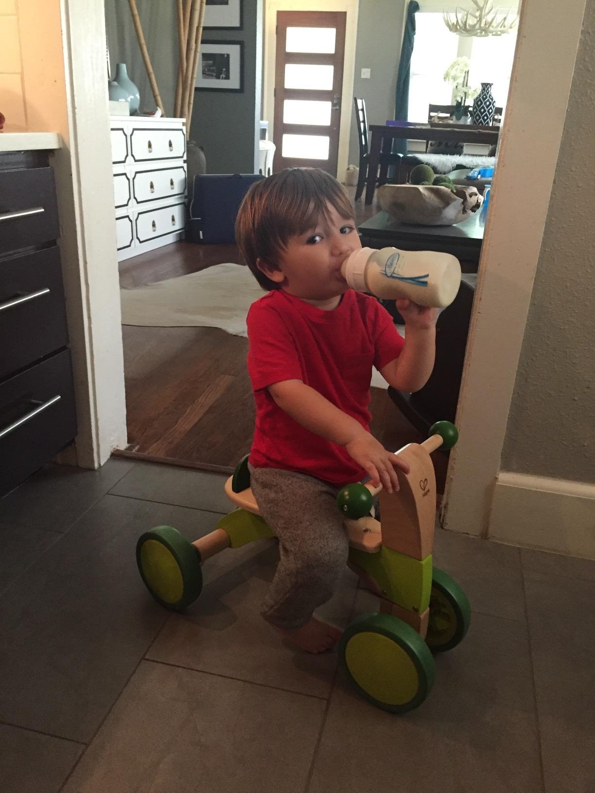 Hape Scoot Around Ride On Wood Bike | Award Winning Four Wheeled Wooden Push Balance Bike Toy for Toddlers with Rubberized Wheels, Bright Green customer photo 1