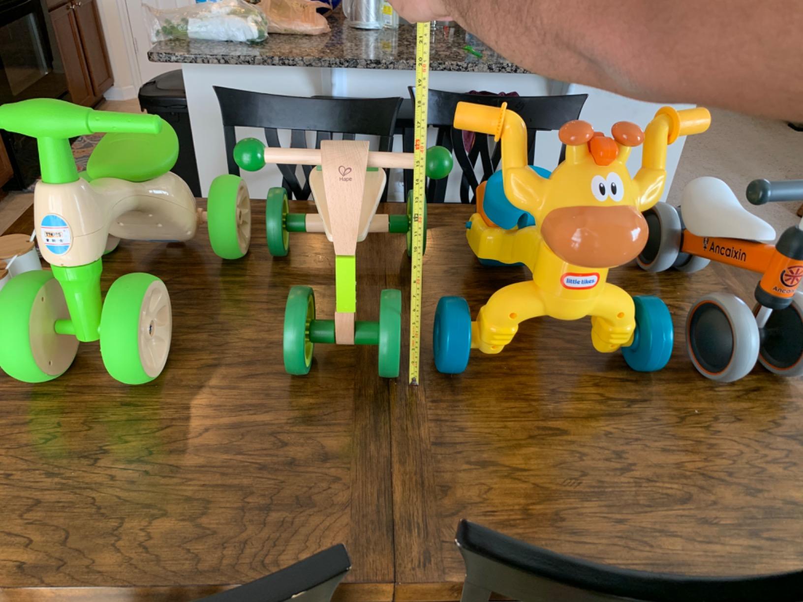 Hape Scoot Around Ride On Wood Bike | Award Winning Four Wheeled Wooden Push Balance Bike Toy for Toddlers with Rubberized Wheels, Bright Green customer photo 2