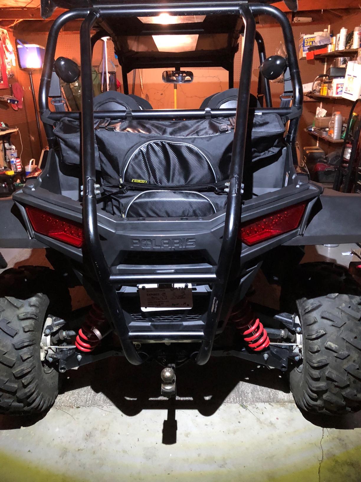 Nelson-Rigg USA UTV Rear Cargo Bag Fits Most UTV's including Polaris RZR, Kawasaki KRX, CFMoto ZForce. Universal Mounting, 2 side pockets, 2 large compartment, reflective accents | Attaches to XP factory roll cage, four zippered compartments, UV-resistant Tri-Max nylon customer photo 1