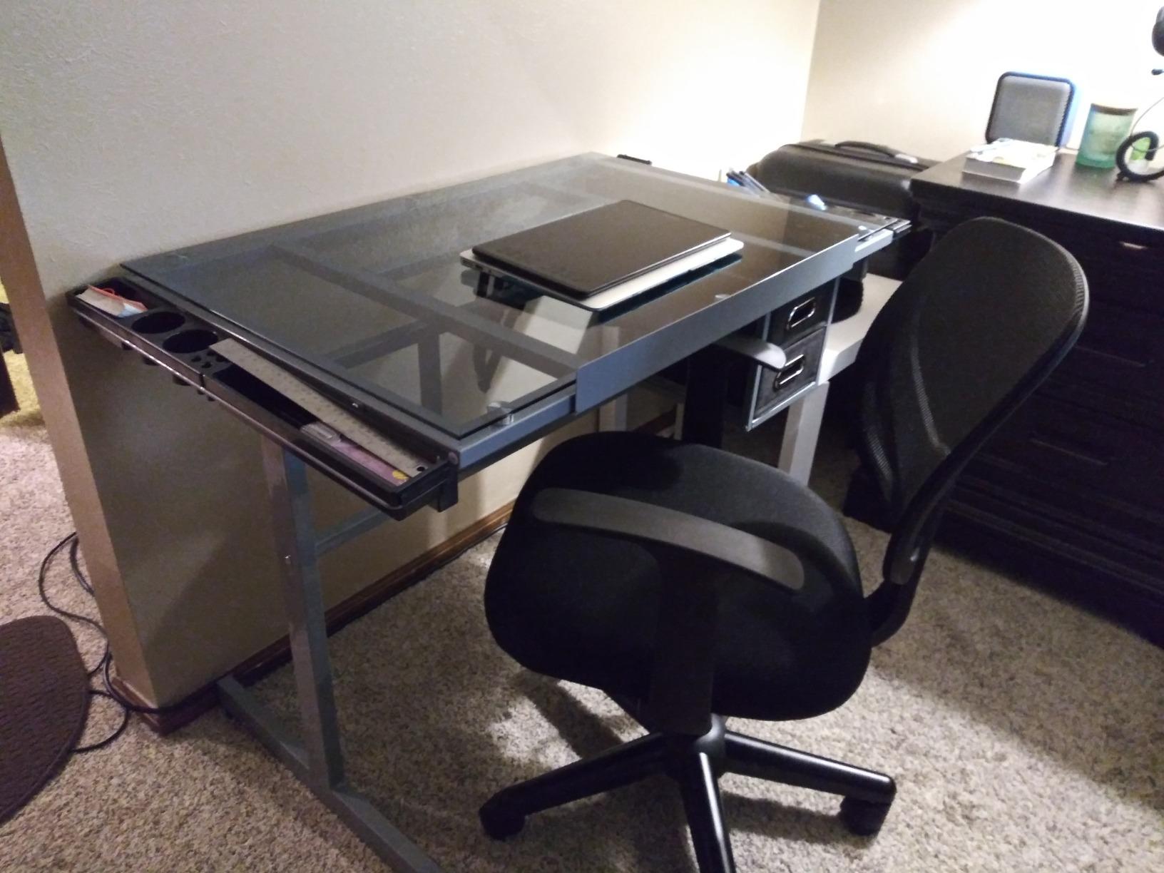 Yaheetech Glass Drafting Table with Storage, Adjustable Art Drawing Desk | Tempered glass top on a steel frame tilts 0-60 degrees for drawing, tracing, or diamond art, plus two fabric drawers and side trays. customer photo 1