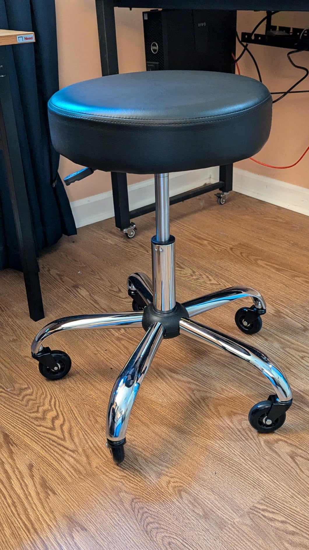 Amazon Basics Drafting Spa Bar Stool with Wheels, Height Adjustable Swivel Seat, Easy to Move, Black, 22.05