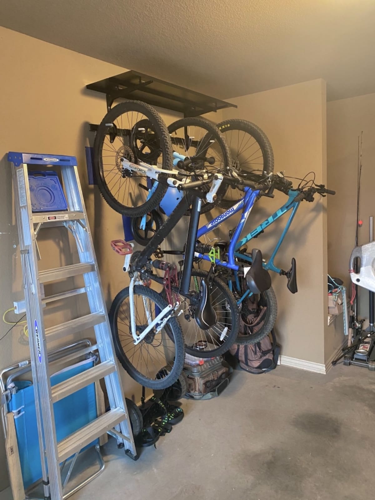 StoreYourBoard Bike Storage Rack with Shelf - Heavy Duty Garage Bike Storage Rack for 5 Bicycles, Adjustable Vertical Bike Rack, Bike Rack Shelf for Helmets & Gear, Holds 300 lbs customer photo 1