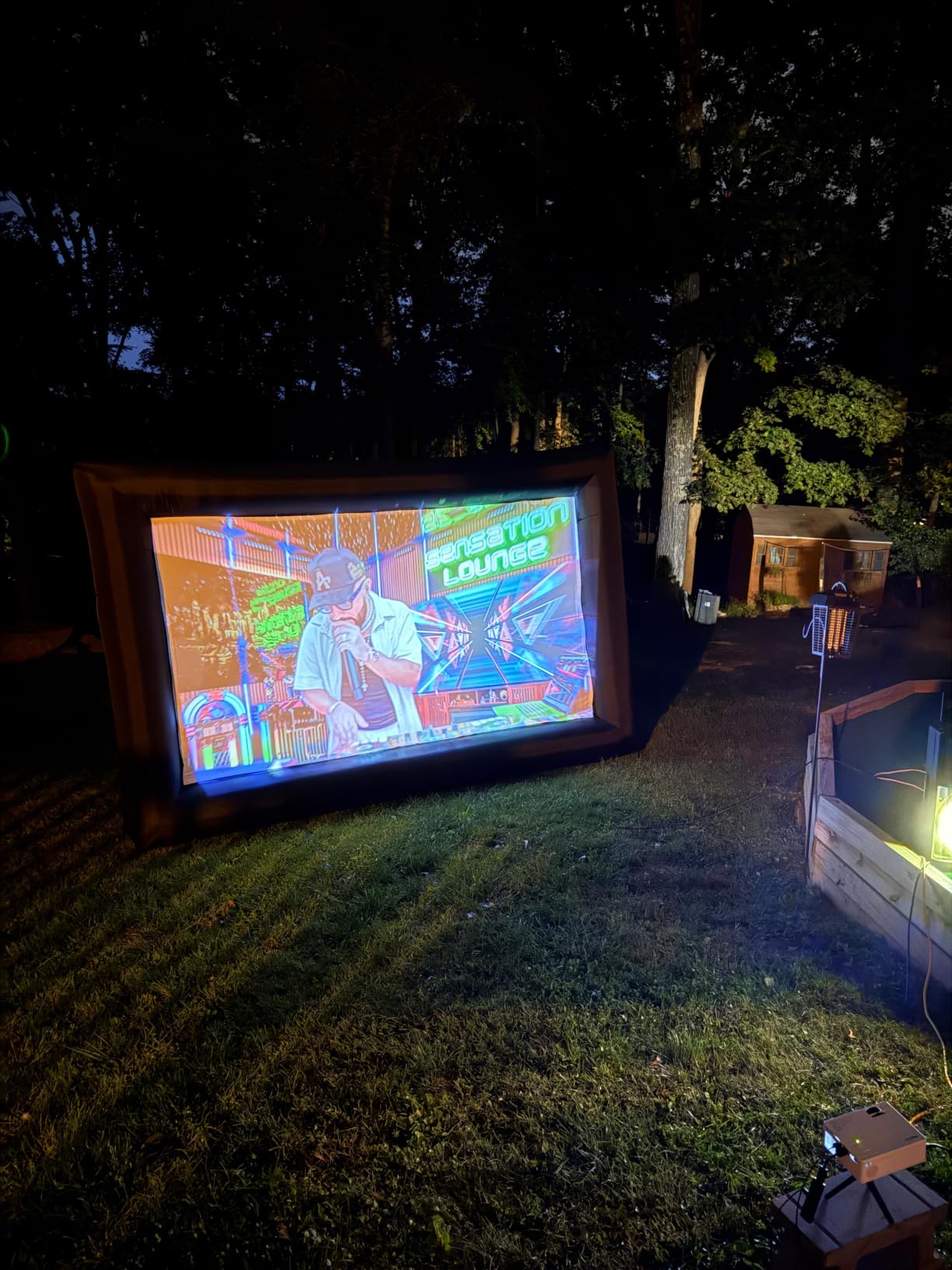 GYUEM 20 feet Inflatable Portable Projector Movie Screen - Huge Air-Blown Cinema Projection Screen Package with Rope, Blower, Tent Stakes - Front & Rear Projection, for Outdoor Party Backyard Pool Fun customer photo 2