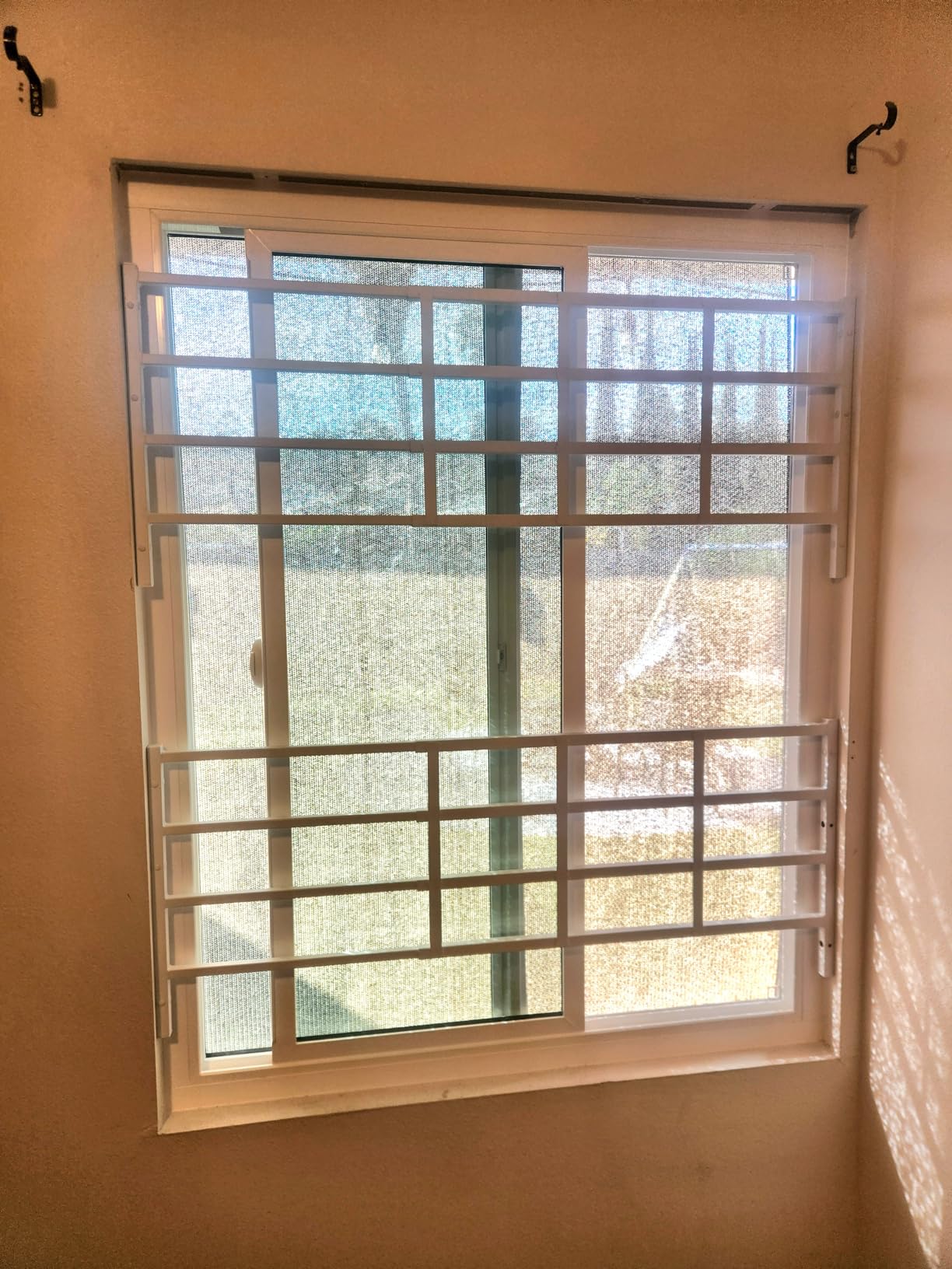 Fixed Window Safety Guard 14 in x 38 in Adjustable Width Prevents Accidental Falls, Non-Egress, Tamper Resistant Screws Included, White, Single Pack customer photo 2