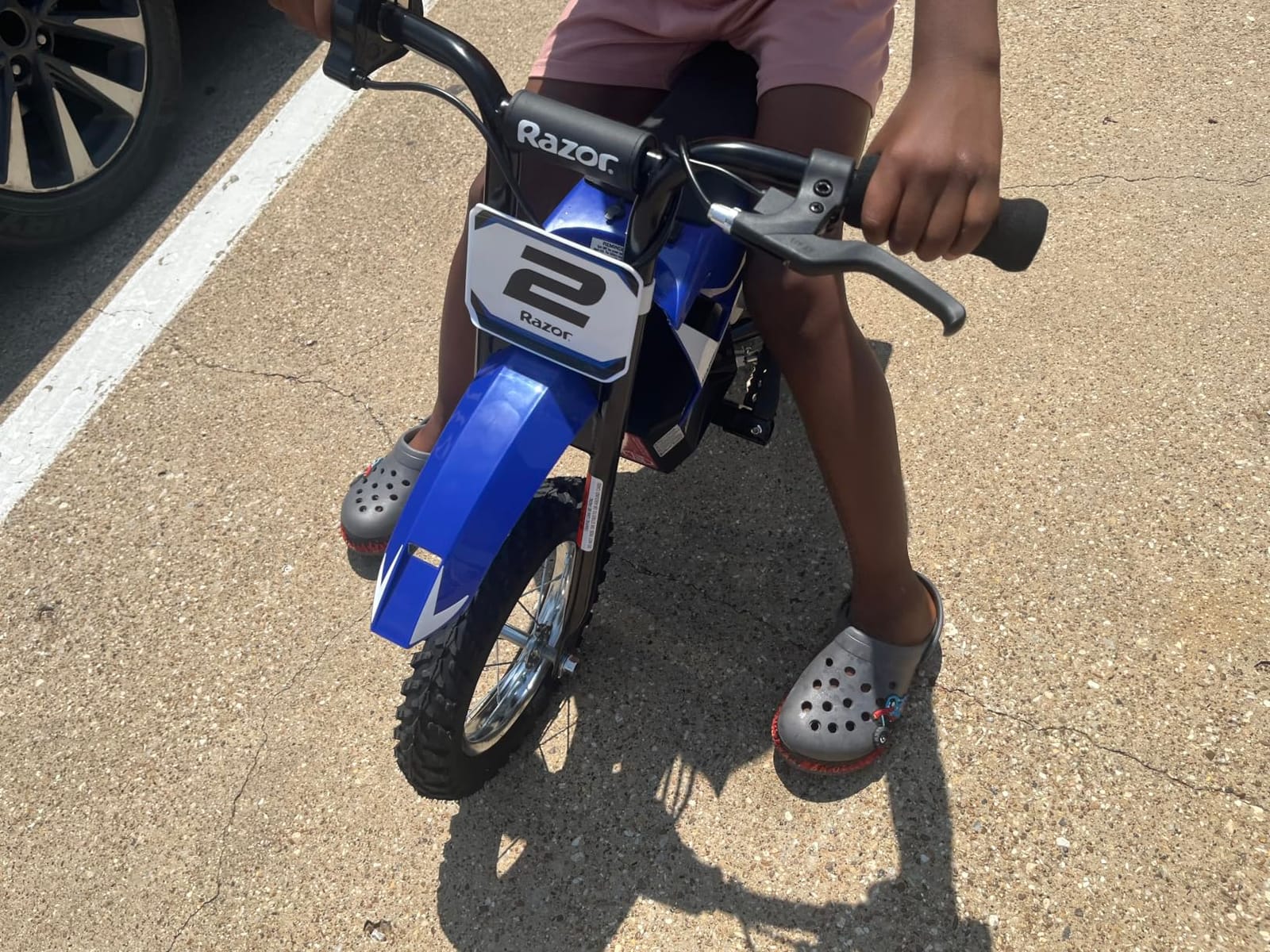 Razor MX125 Dirt Rocket Electric-Powered Bike with Authentic Motocross Geometry, Rear-Wheel Drive, 100-watt High-Torque Chain-Driven Motor, for Kids 7+, Blue customer photo 2
