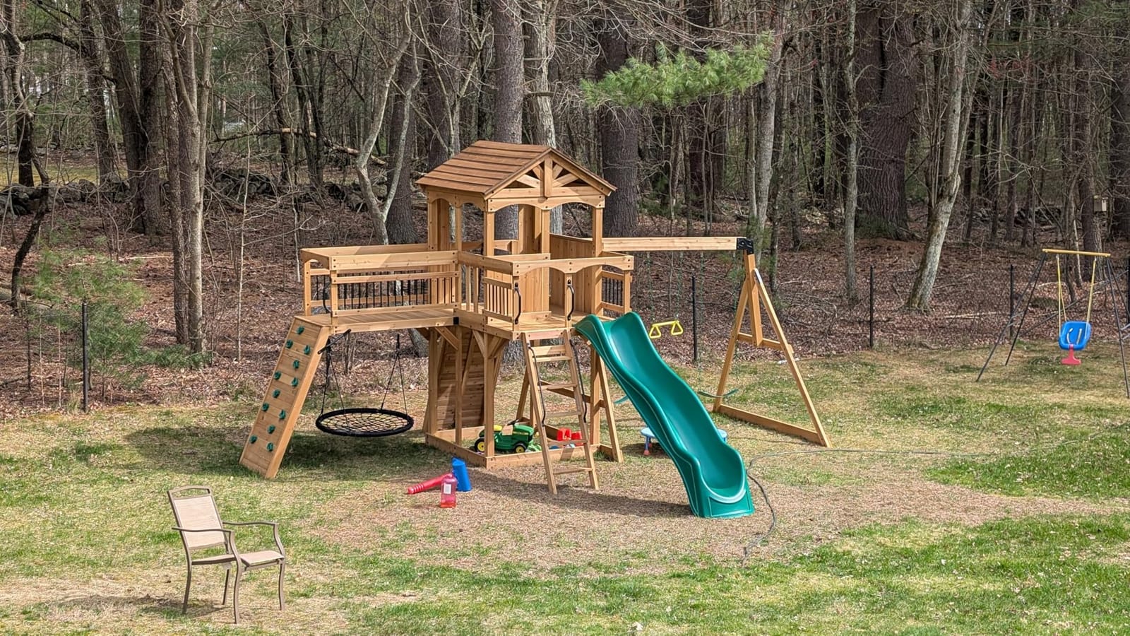 Backyard Discovery Sterling Point Cedar Wood Swing Set with Wave Slide, Raised Clubhouse, Wooden Bridge, Rock Wall, Belt Swings, Web Swing, Trapeze, Balcony, Climbing Wall, Ladder, Outdoor Playset customer photo 1