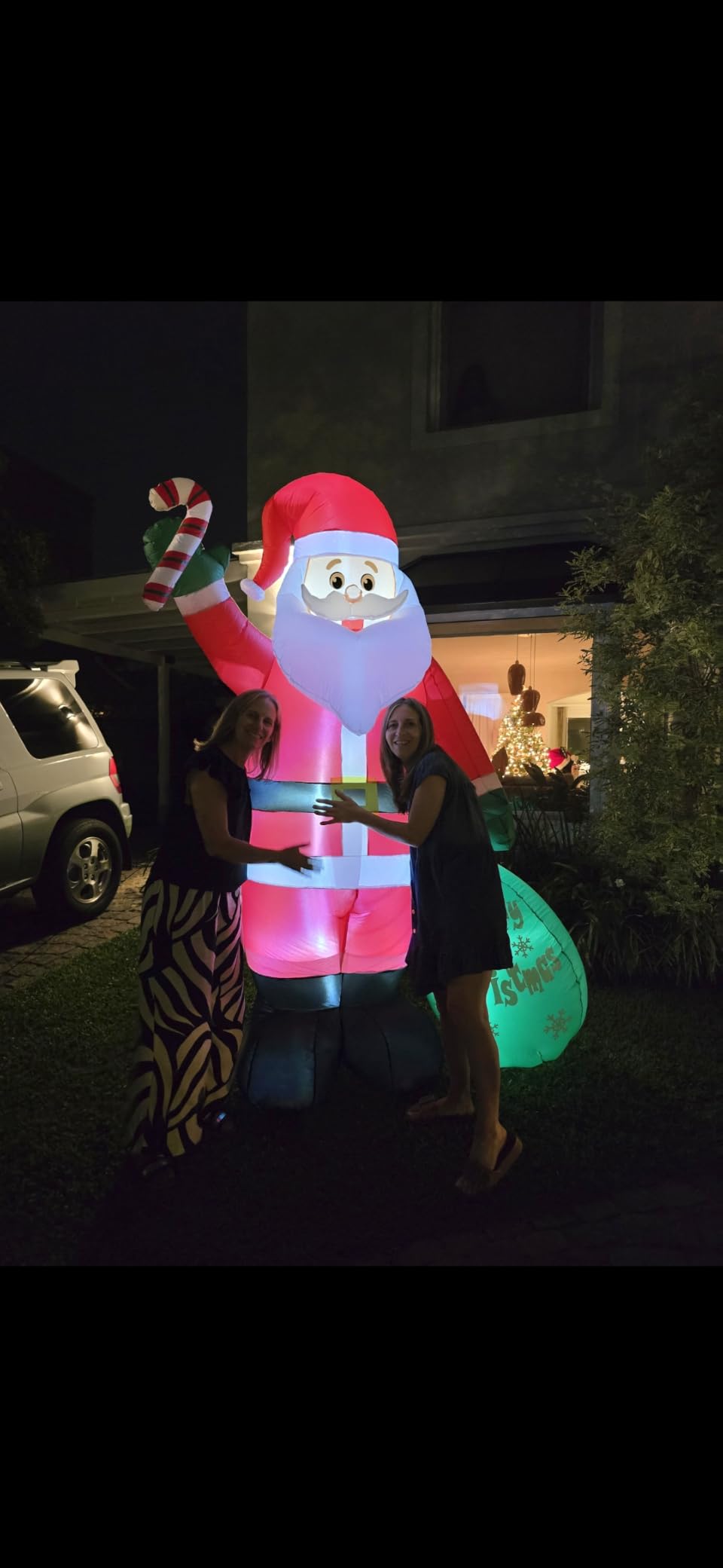 8 FT Christmas Inflatable Santa Claus with Candy and Big Gift Bag Outdoor Decor, Blow Up IP44 Weatherproof Xmas Decorations for Yard, Built-in LED Light for Gardern Lawn Indoor Winter Holiday customer photo 1