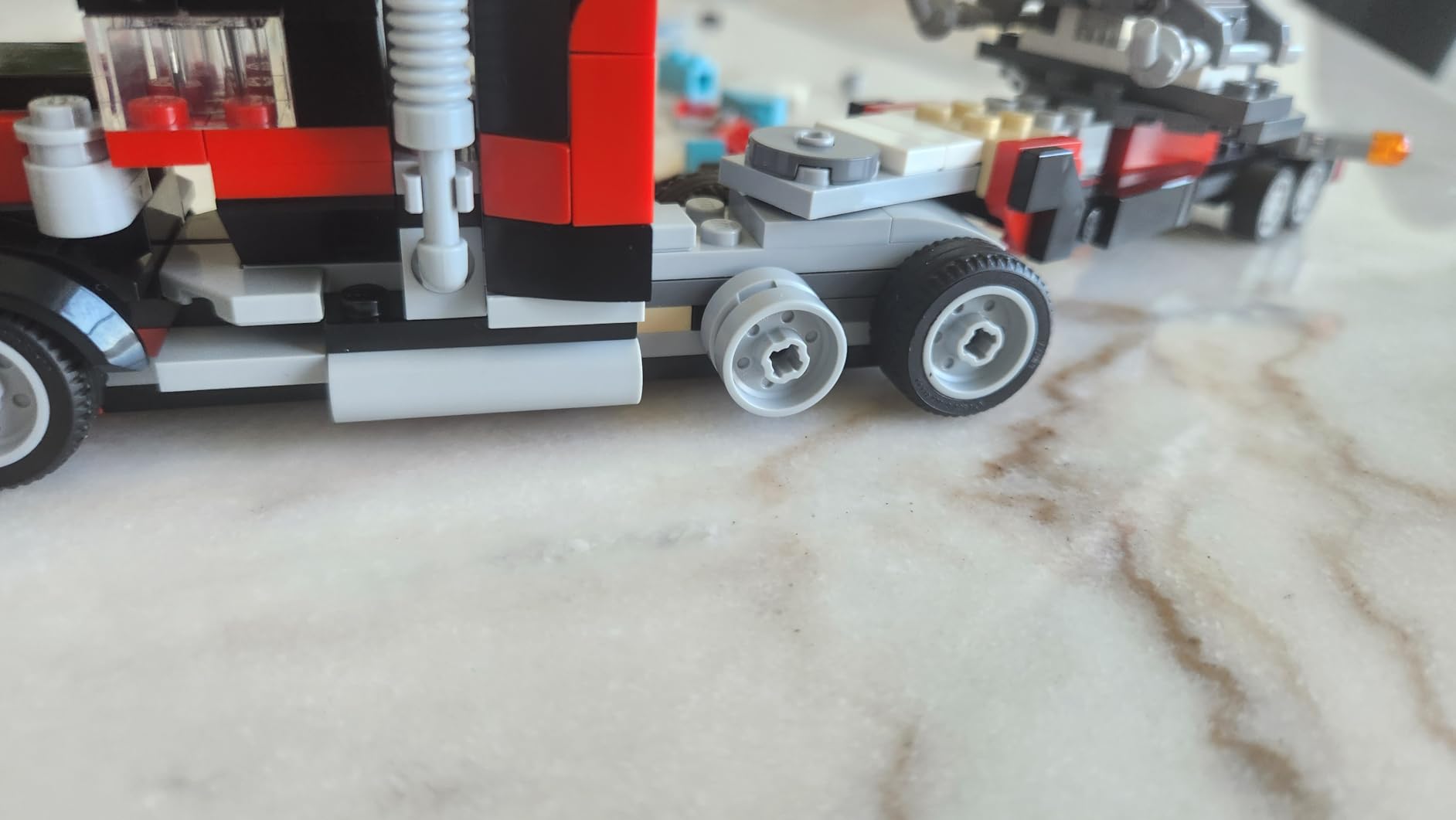 Creator 3 in 1 Flatbed Truck with Helicopter Toy, Transforms from Flatbed Truck Toy to Propeller Plane to Hot Rod and SUV Cars, Gift Idea for Boys and Girls Ages 7 Years Old and Up, 31146 customer photo 1