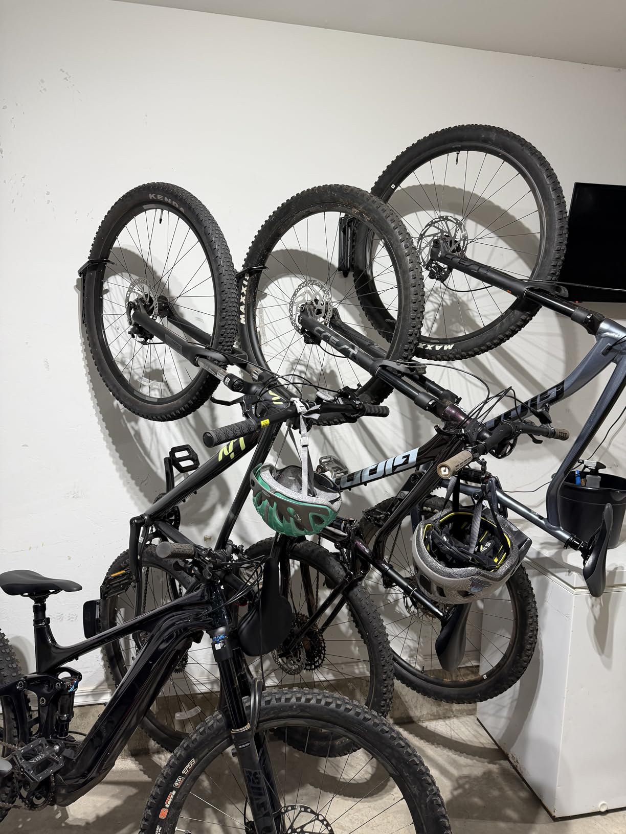 monTEK Swivel Bike Wall Mount, Bike Hangers for Garage, 4 Pack - Heavy-duty vertical wall bike storage rack swivels 150 to save space; holds 66 lb each and fits tires up to 3.54 in wide customer photo 1