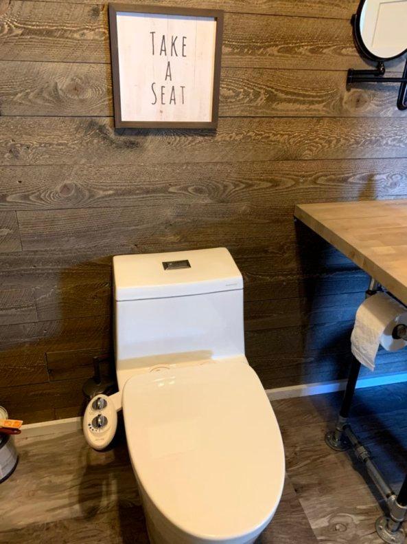 WOODBRIDGEE One Piece Toilet with Soft Closing Seat, Chair Height, 1.28 GPF Dual, Water Sensed, 1000 Gram MaP Flushing Score Toilet with Chrome Button, White, B0940-F-C customer photo 2