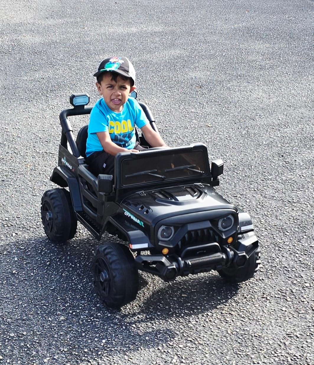 MINIATURE MOTORS 12V Kids Electric Ride on Truck Car Remote Control, Twin 35W Motors 3.5MPH Max Speed, Bluetooth Music Player, 4 Wheels Suspension LED Lights Safety Belt, Gift for Boys & Girls-Black customer photo 1