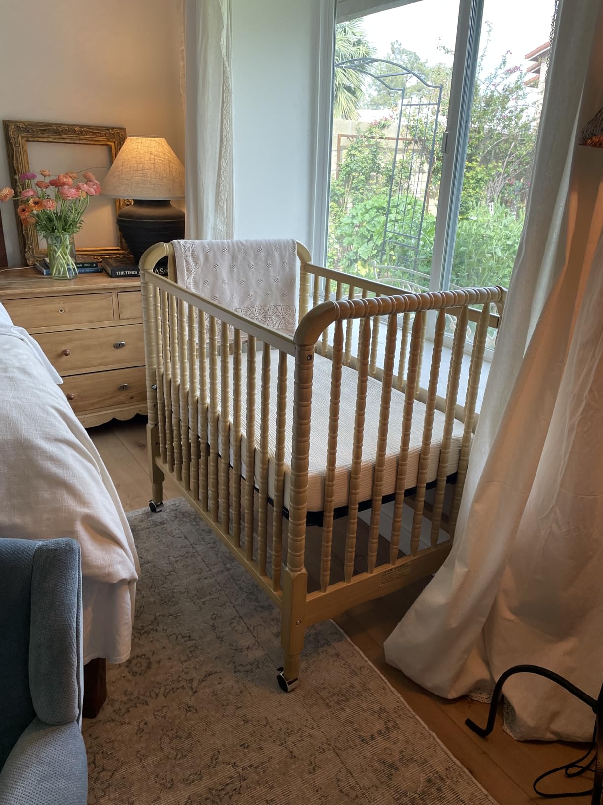 Davinci Jenny Lind 3-in-1 Convertible Mini Crib in Honey, Removable Wheels, Greenguard Gold Certified customer photo 1