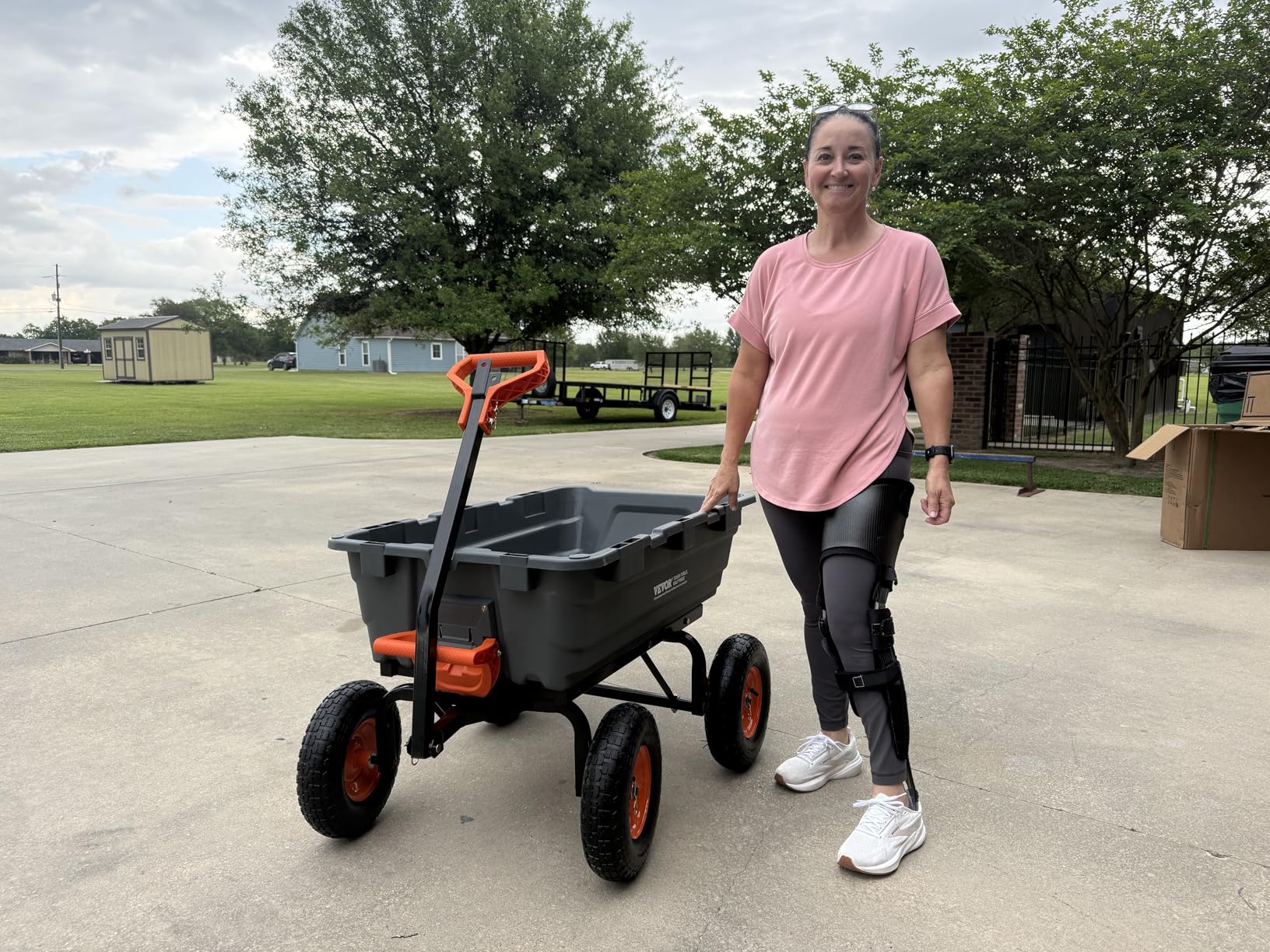 VEVOR Heavy Duty 1200lbs 7 Cu.Ft Wheelbarrow Garden Dump Cart Wagon, 2-in-1 Convertible Handle customer photo 1