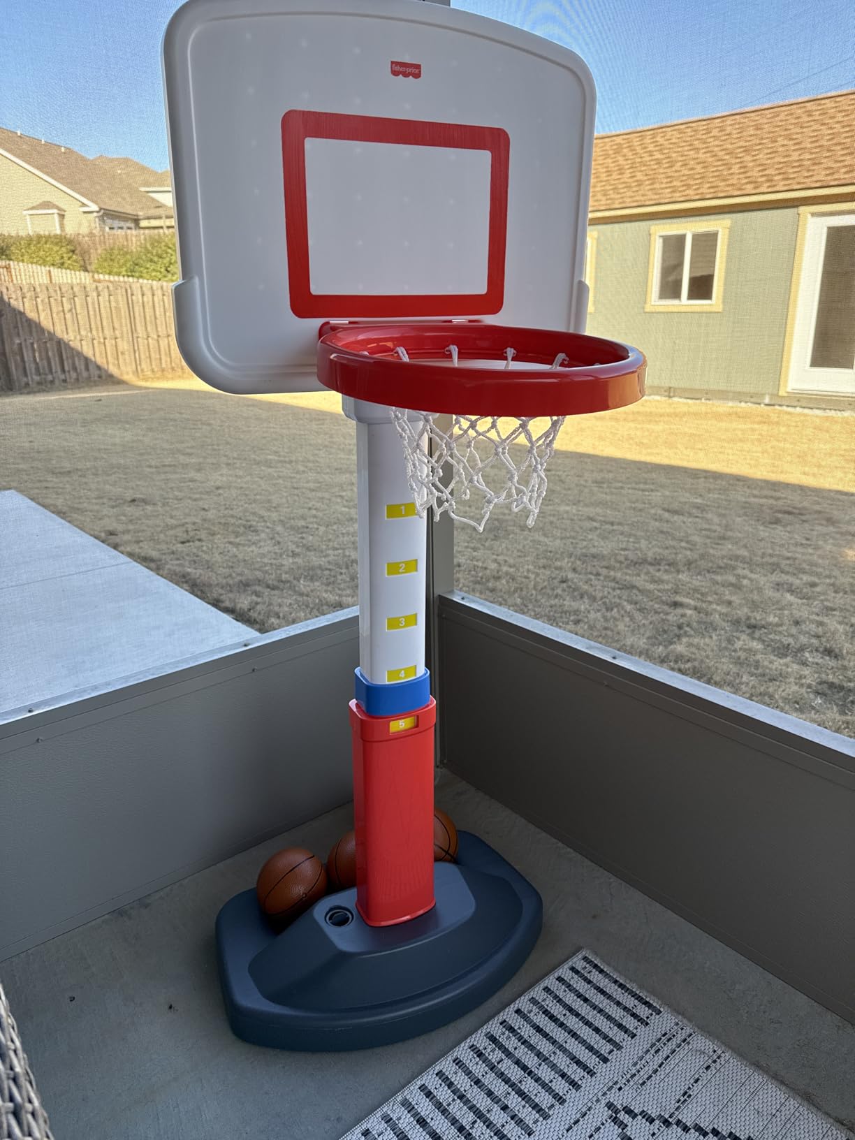 Fisher-Price Grow-to-Pro Basketball Hoop for Toddlers & Kids - Adjustable Height Indoor/Outdoor Play Set with Ball, 18 Months - 5 Year customer photo 1