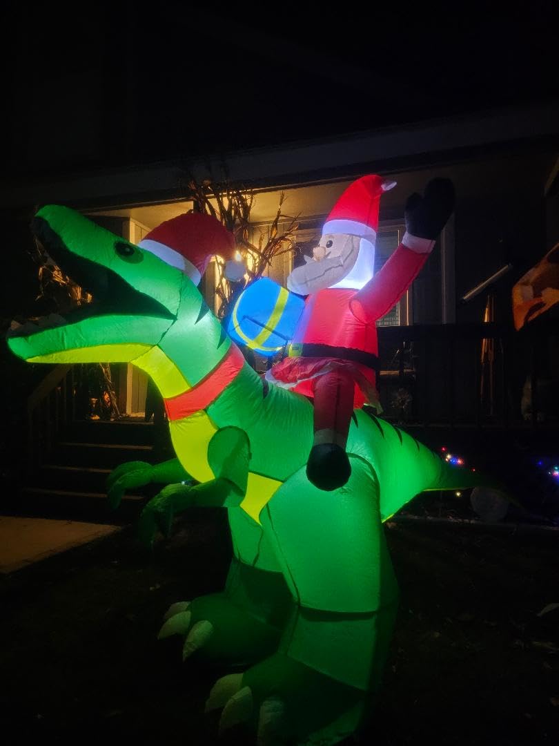 9x7FT Christmas Inflatables Santa Ride on Dinosaur with LED Outdoor Christmas Dinosaur Inflatable Blow Up Yard Decorations with Sandbags Stakes Strings for Garden Decor customer photo 1