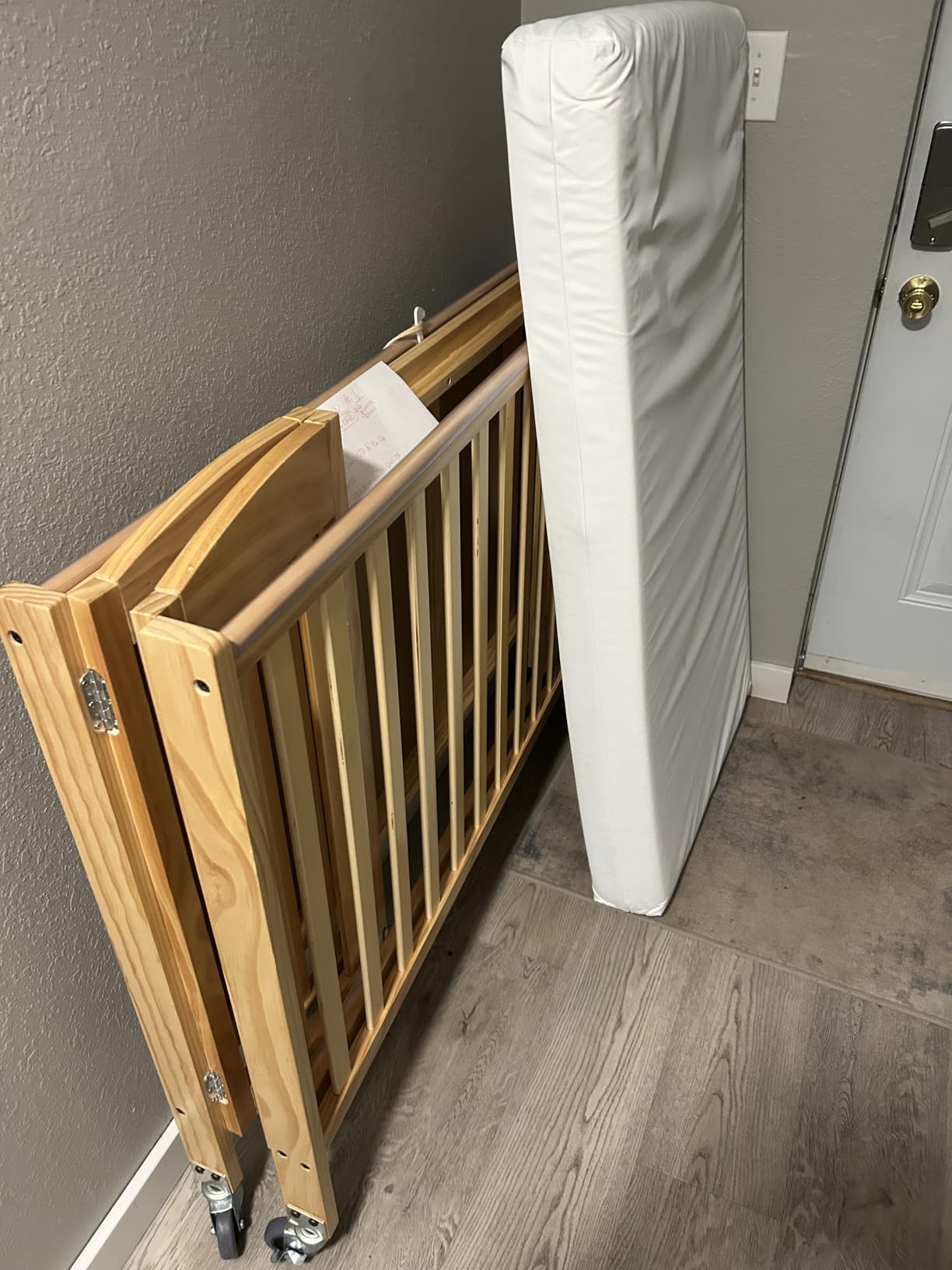 Dream On Me Folding Full Size Convenience Baby Crib with Durable Metal Wheels, Portable Space-Saving Design, 2 Adjustable Heights, Easy Fold Flat Storage, GREENGUARD Gold & BSA Certified, White customer photo 2